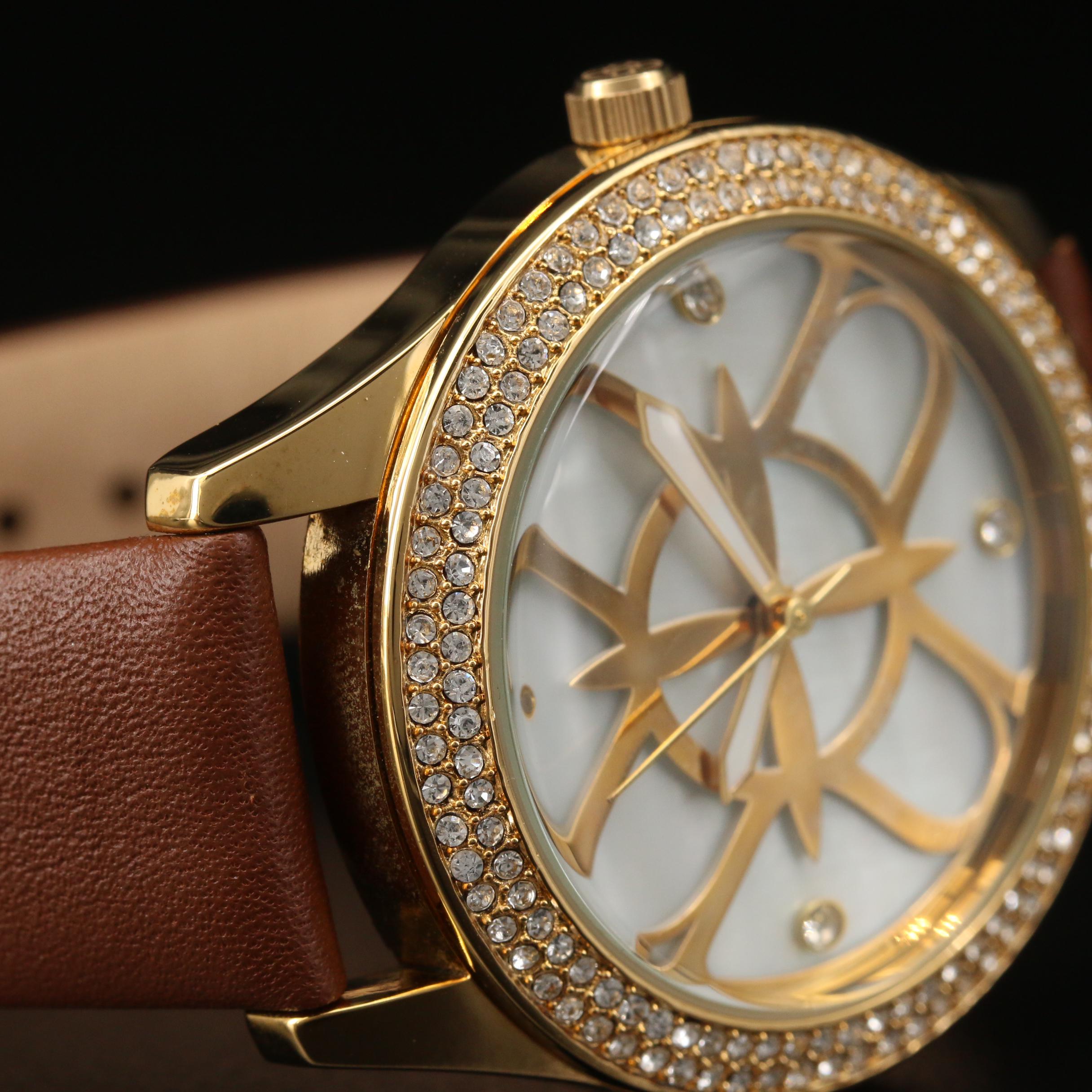 Nicole by Nicole Miller Crystal and Gold Tone Quartz Watch