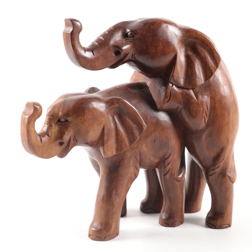 Hand-Carved Wood Mating Elephants Figurine