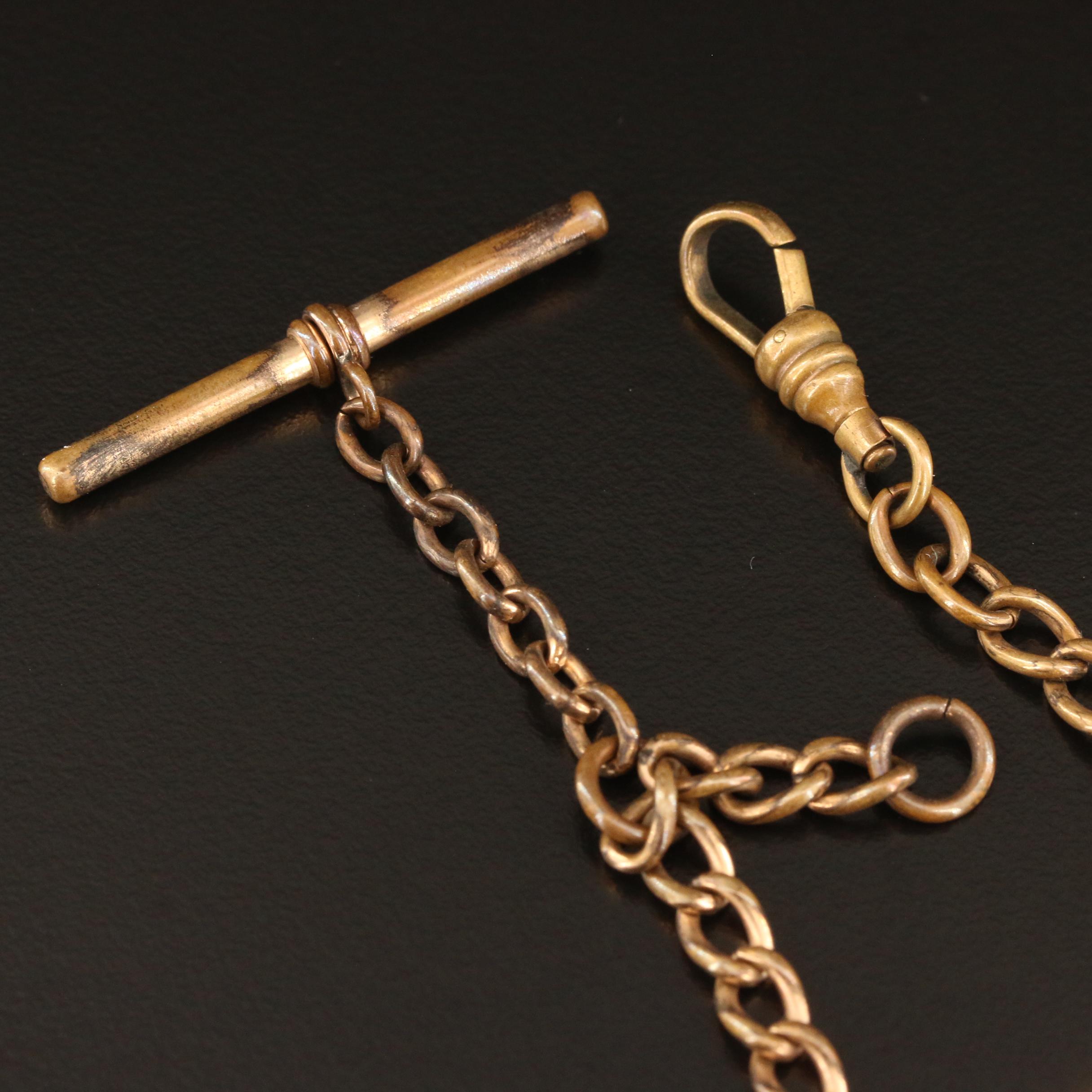 Antique and Vintage Mix of Jewelry Featuring a Miniature Dictionary Pendant