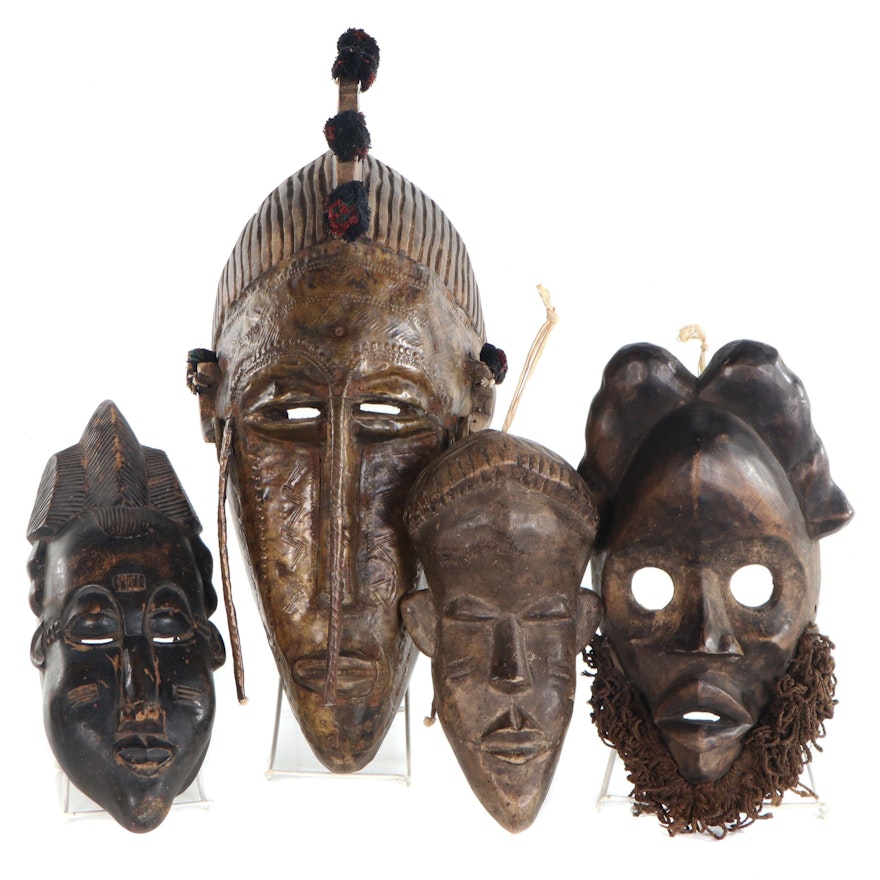 West African Carved Wood Masks Including Dan, Marka, and Others