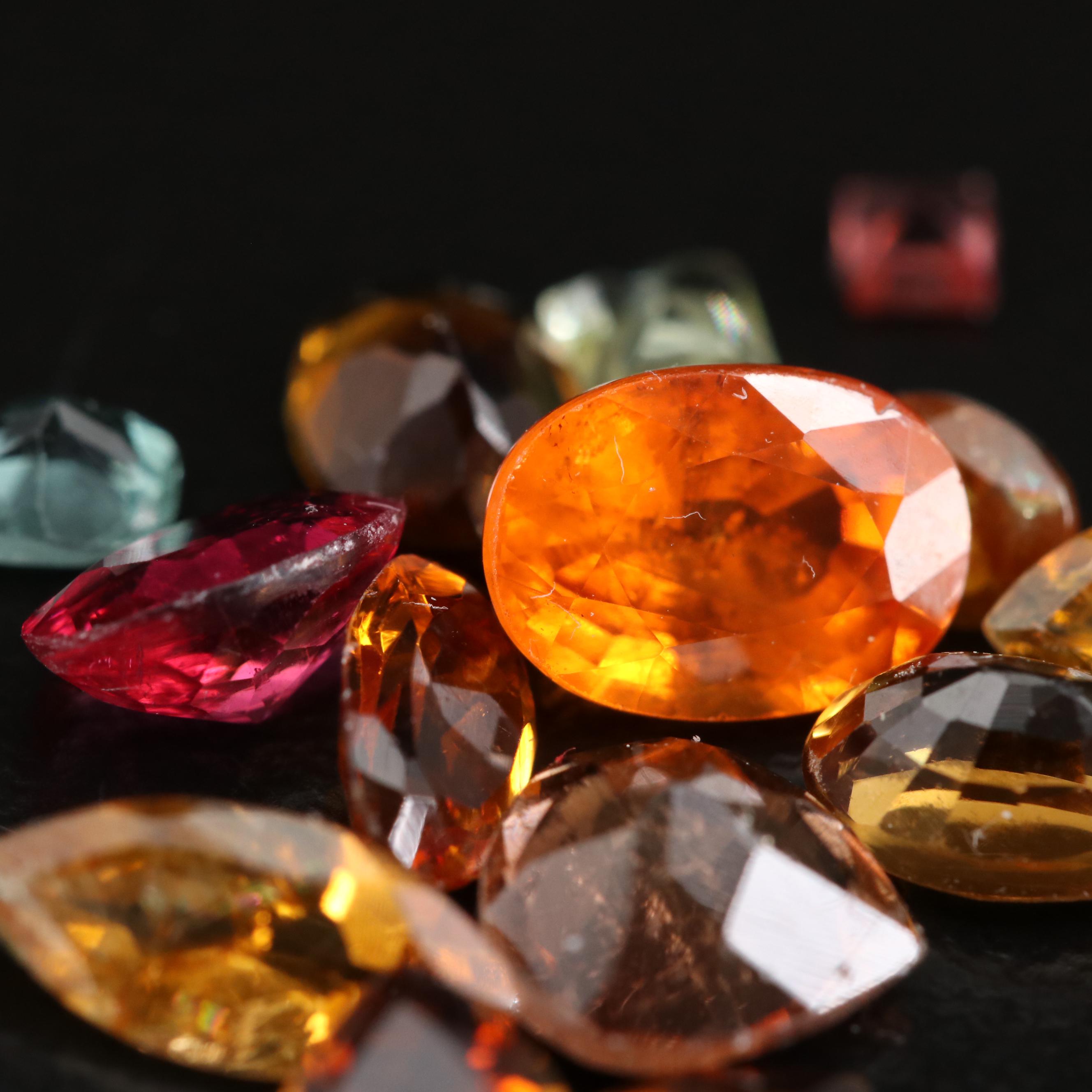 Loose Mixed Gemstones Including Tourmaline and Spessartine
