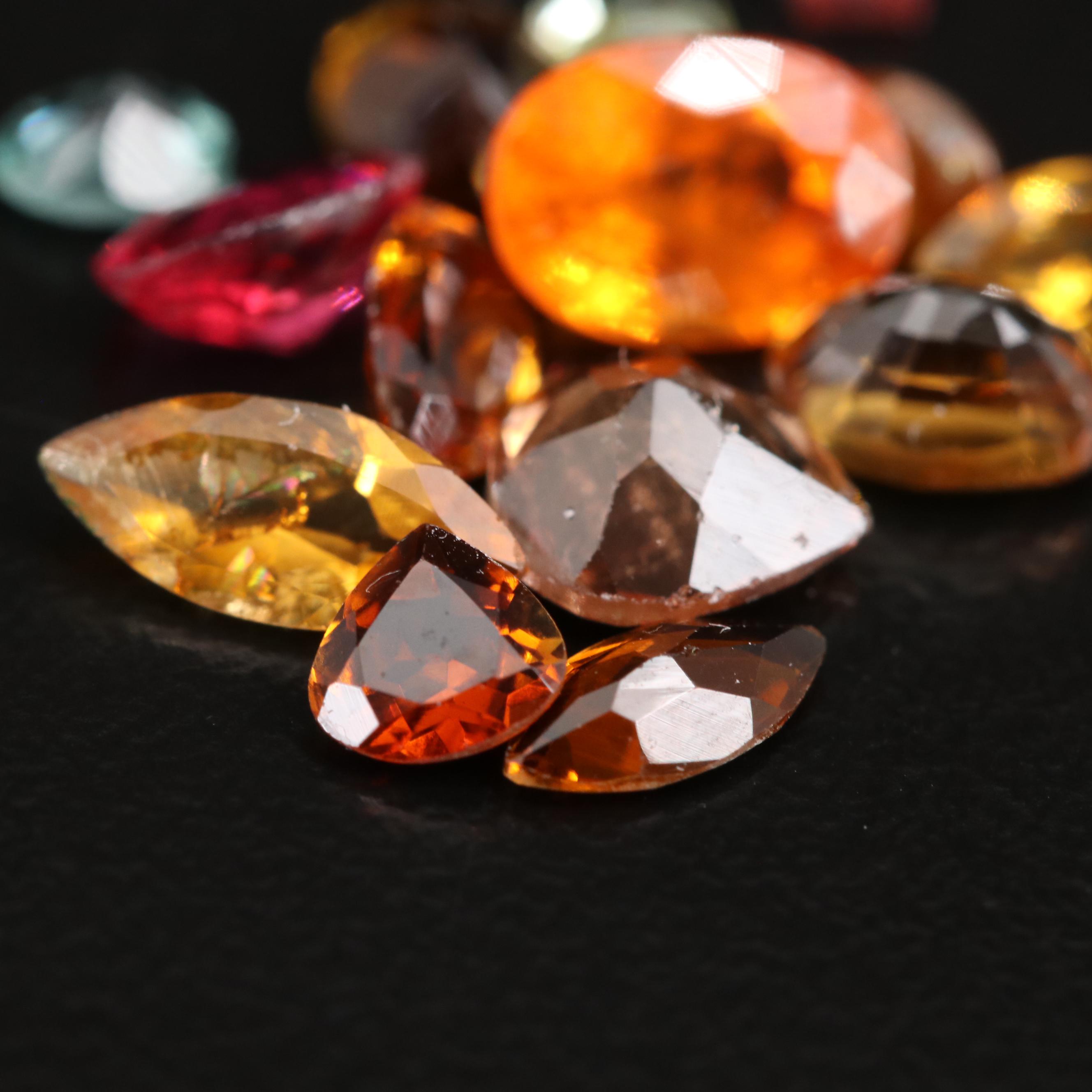 Loose Mixed Gemstones Including Tourmaline and Spessartine