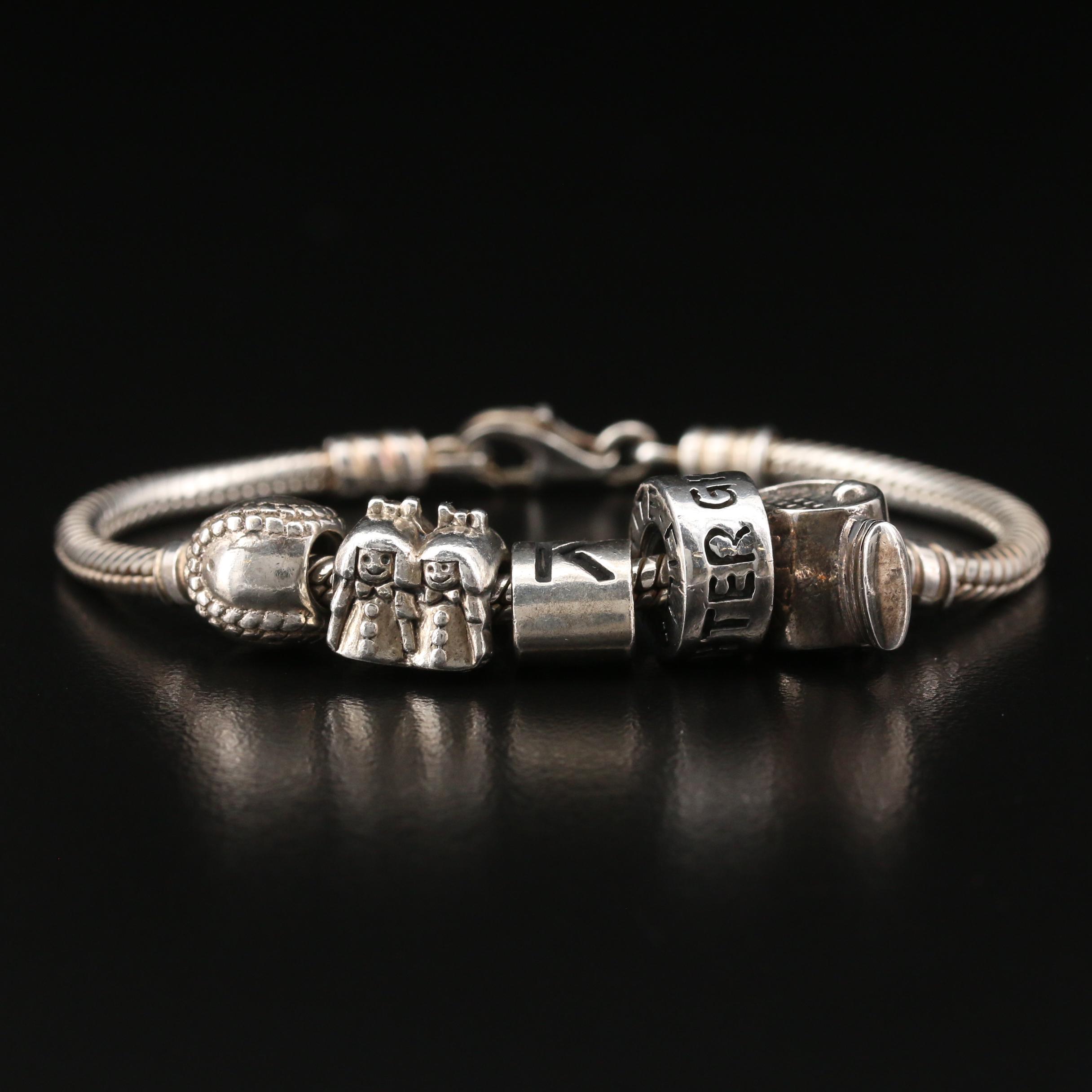 Sterling Silver Charm Bracelet Including "Granddaughter" Charm