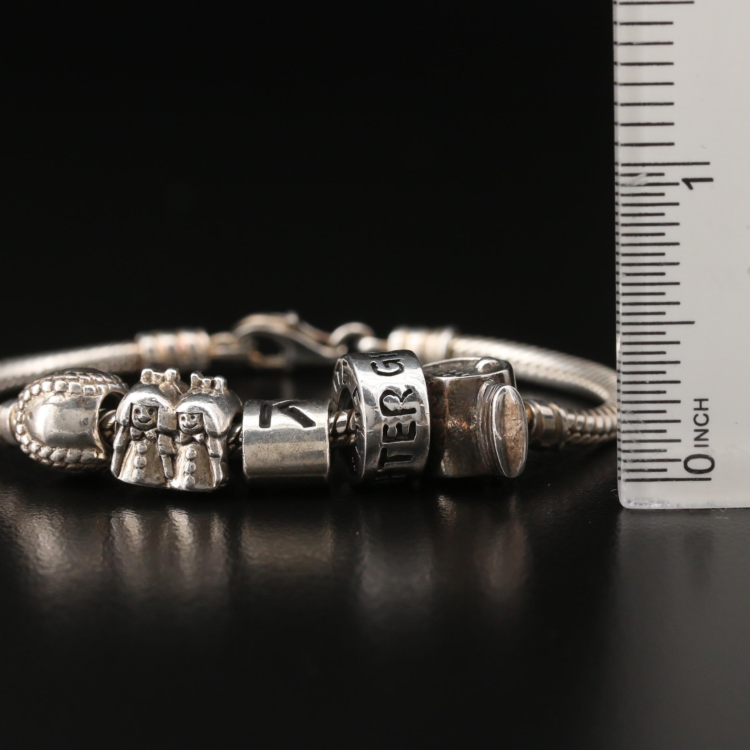 Sterling Silver Charm Bracelet Including "Granddaughter" Charm