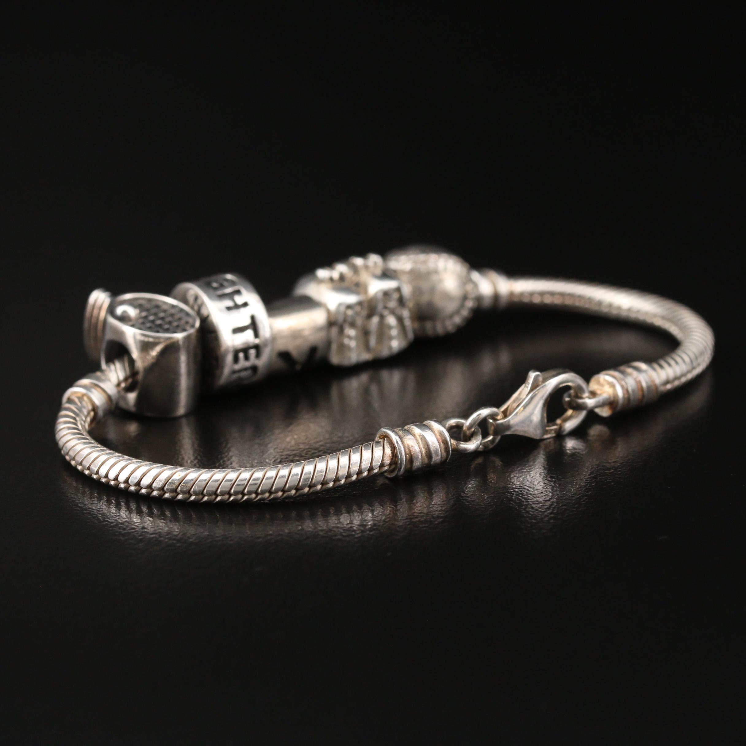 Sterling Silver Charm Bracelet Including "Granddaughter" Charm