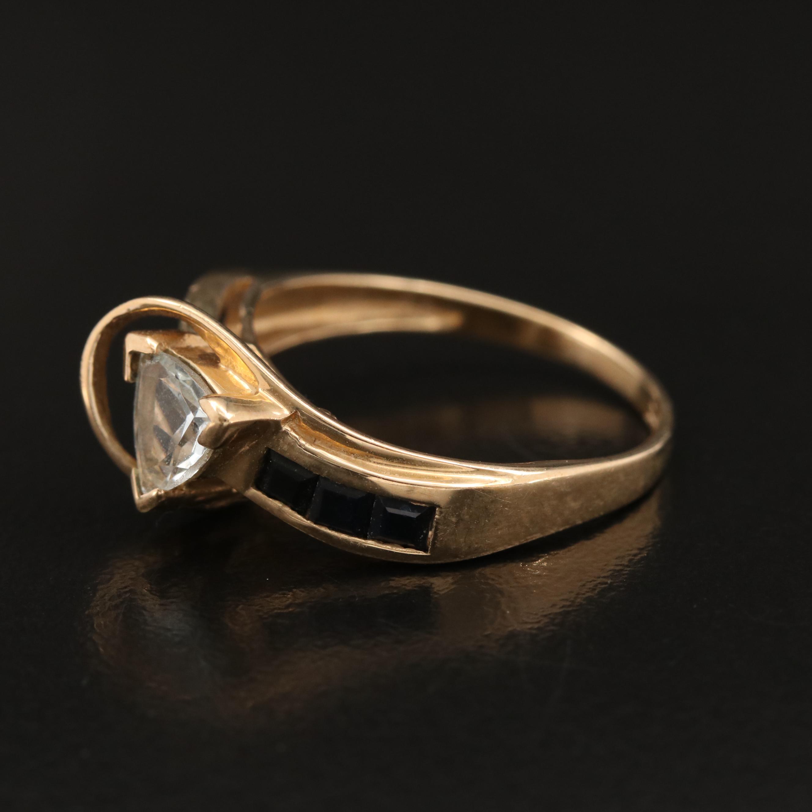 10K Aquamarine Ring with Channel Set Sapphire Shoulders