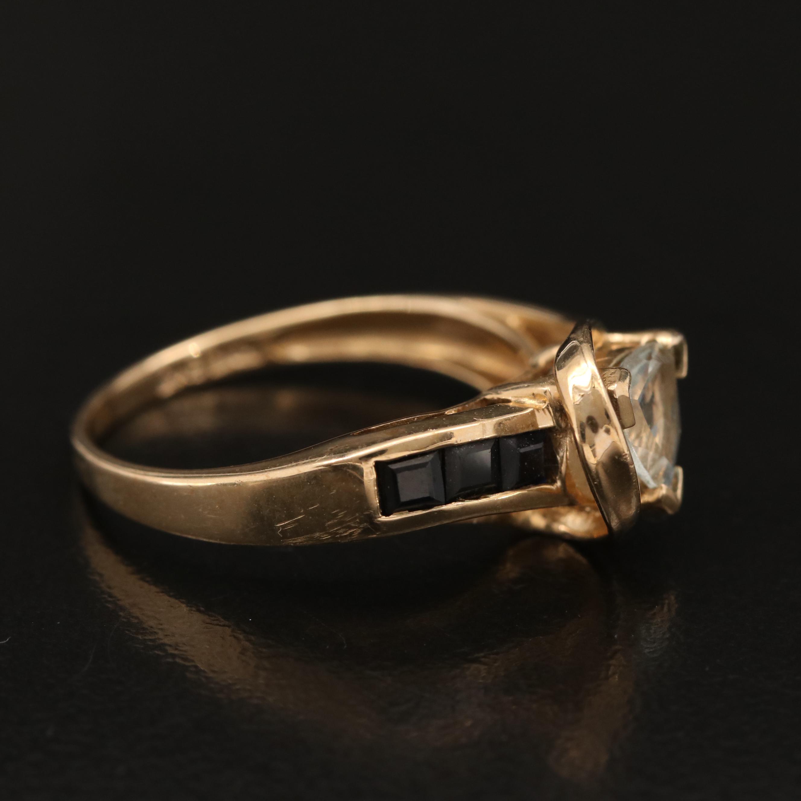 10K Aquamarine Ring with Channel Set Sapphire Shoulders