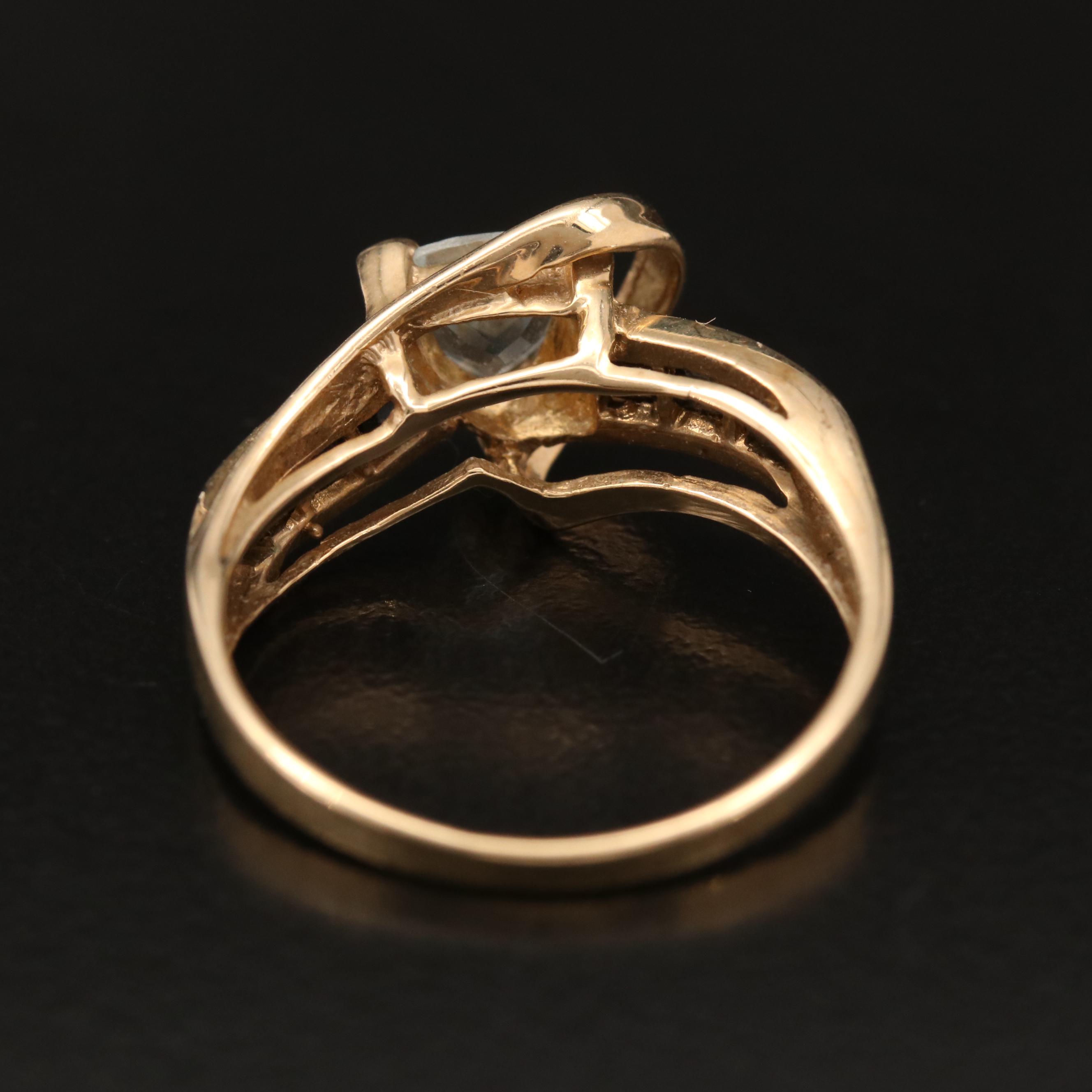 10K Aquamarine Ring with Channel Set Sapphire Shoulders