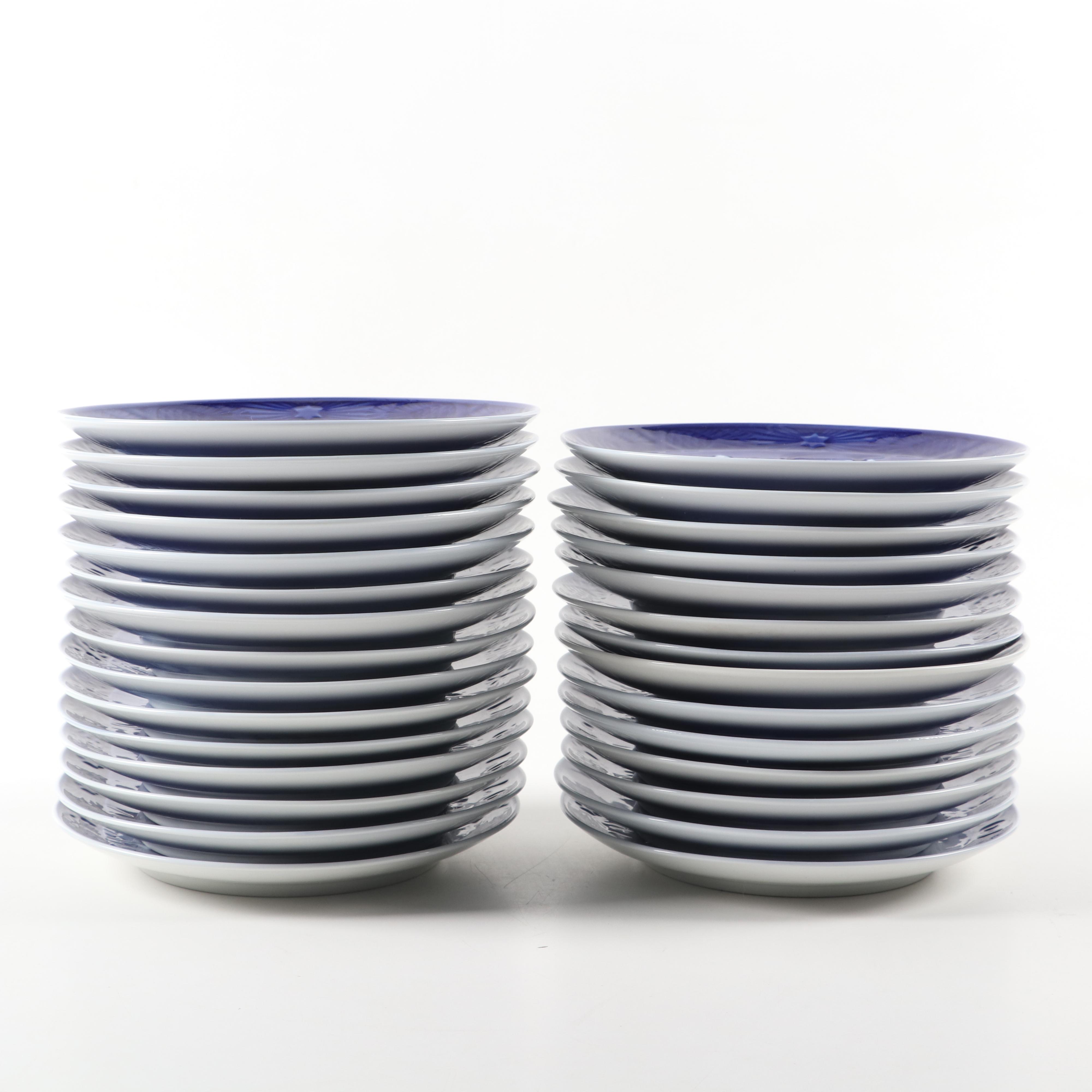 Royal Copenhagen "Trimming the Tree" and Other Porcelain Christmas Plates