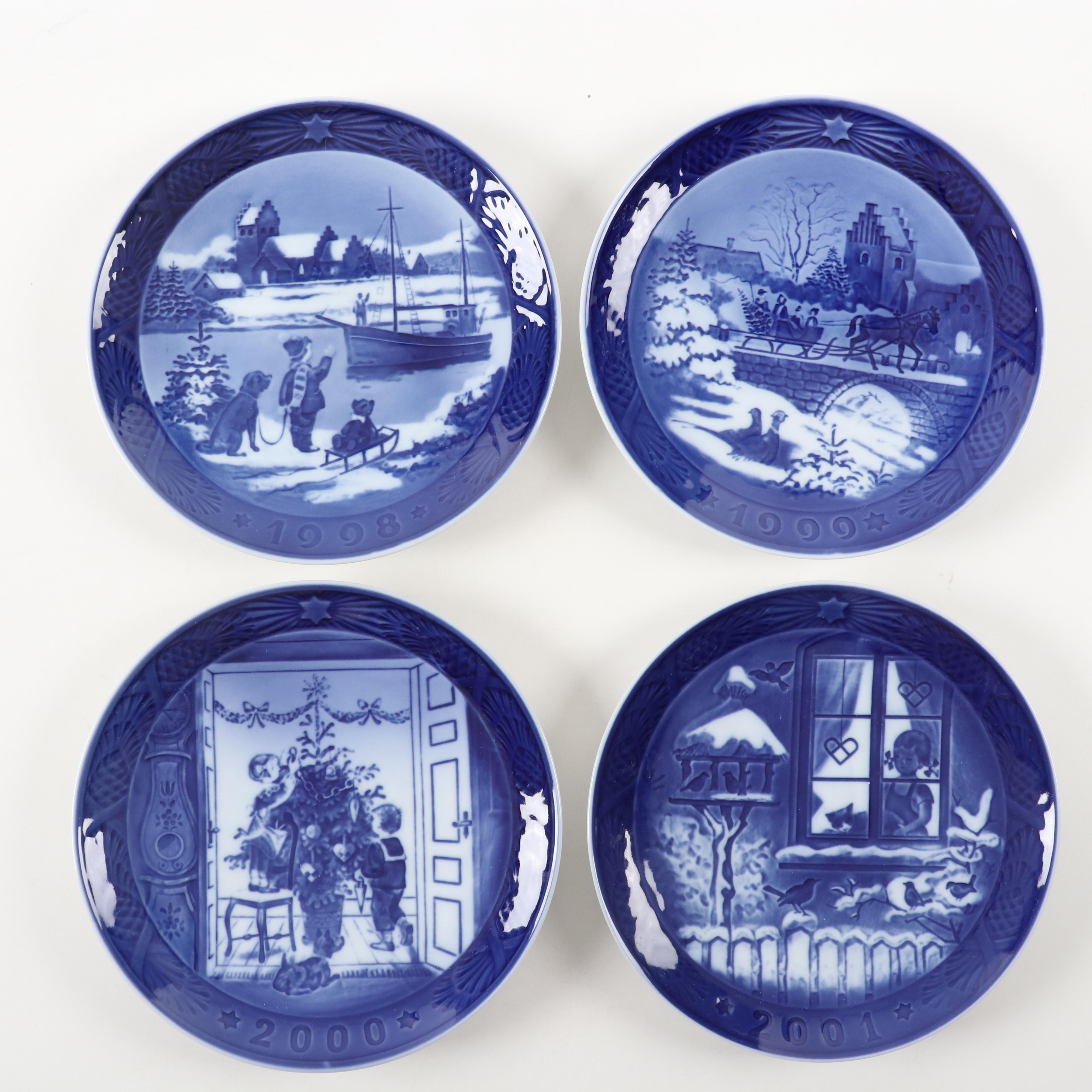 Royal Copenhagen "Trimming the Tree" and Other Porcelain Christmas Plates