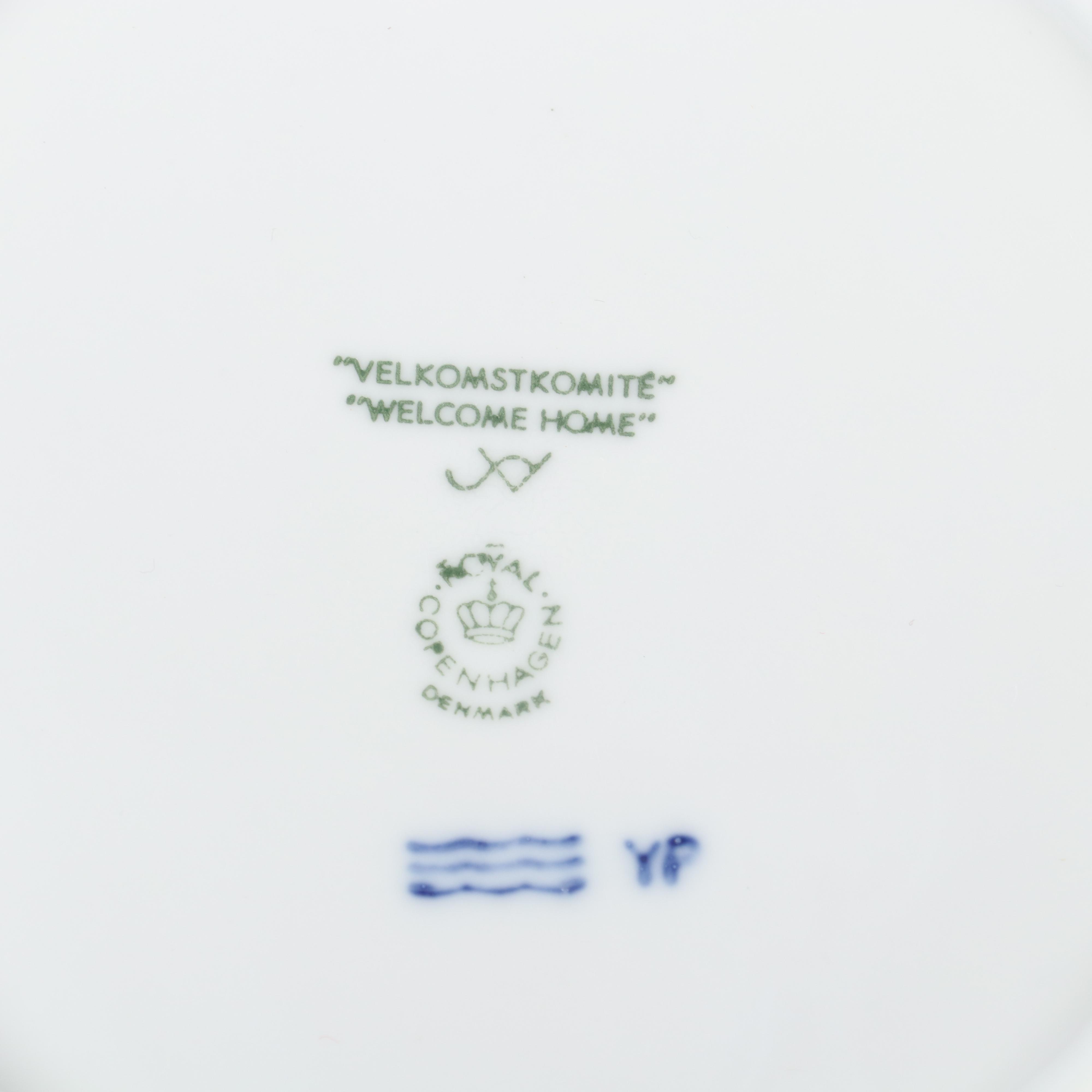 Royal Copenhagen "Trimming the Tree" and Other Porcelain Christmas Plates