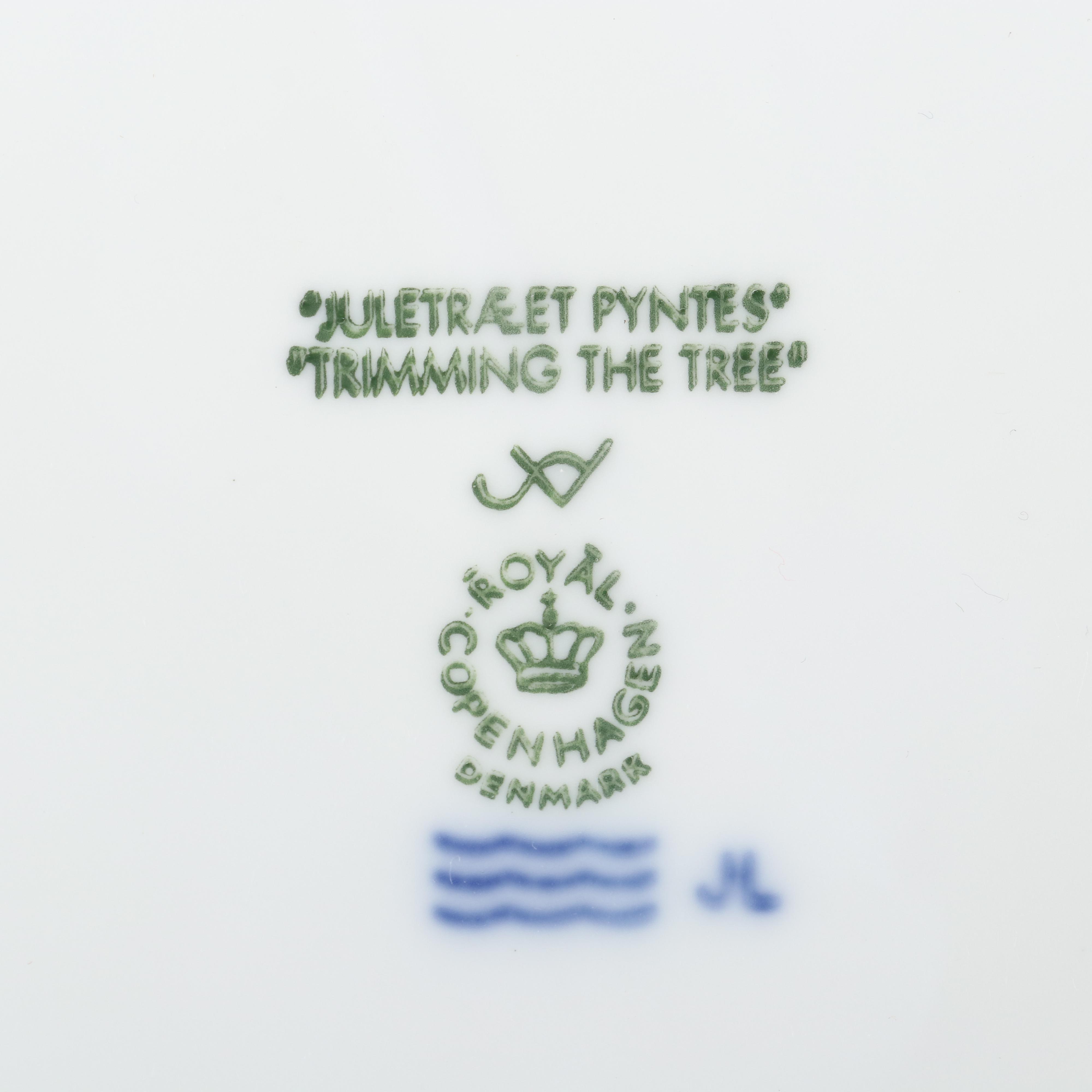 Royal Copenhagen "Trimming the Tree" and Other Porcelain Christmas Plates