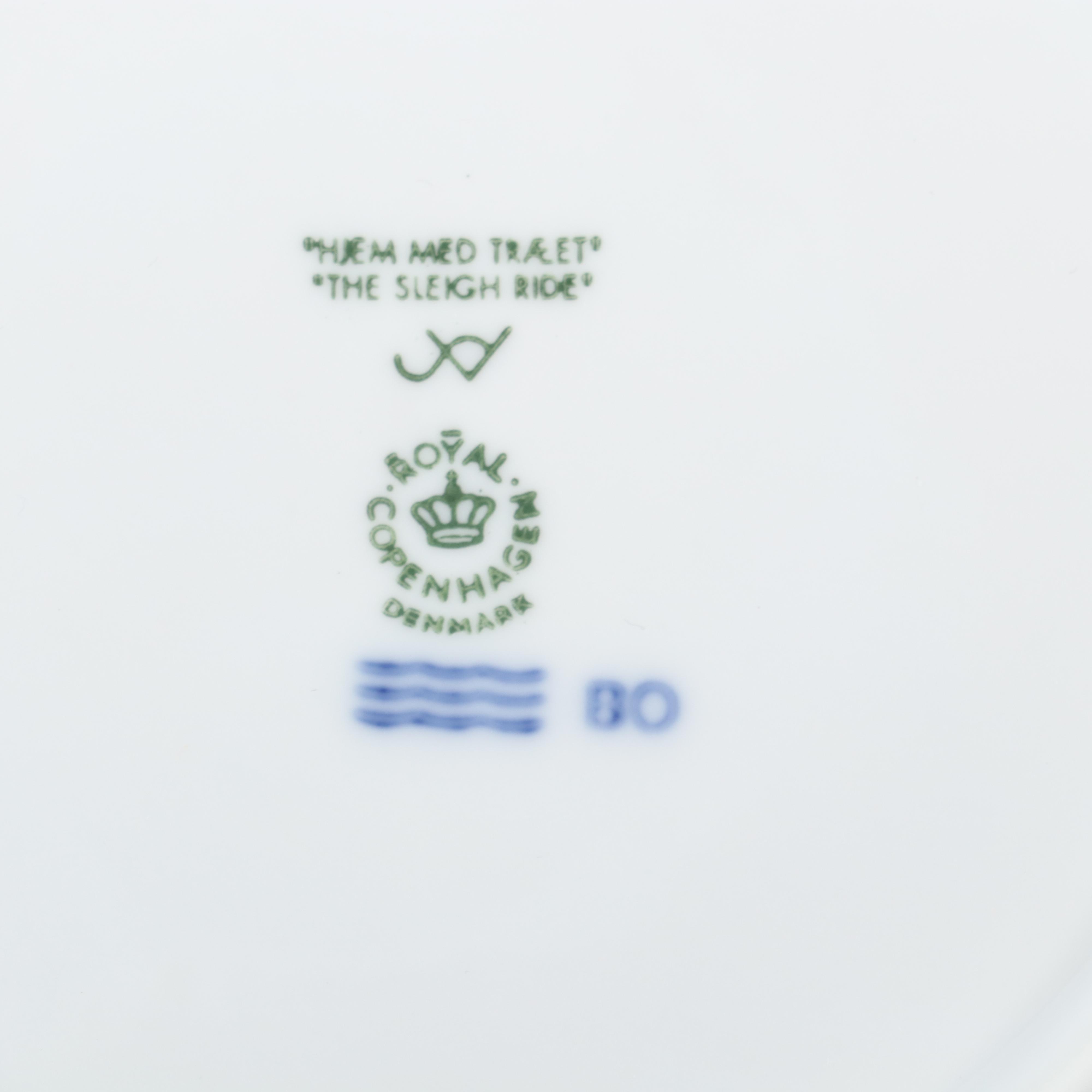 Royal Copenhagen "Trimming the Tree" and Other Porcelain Christmas Plates