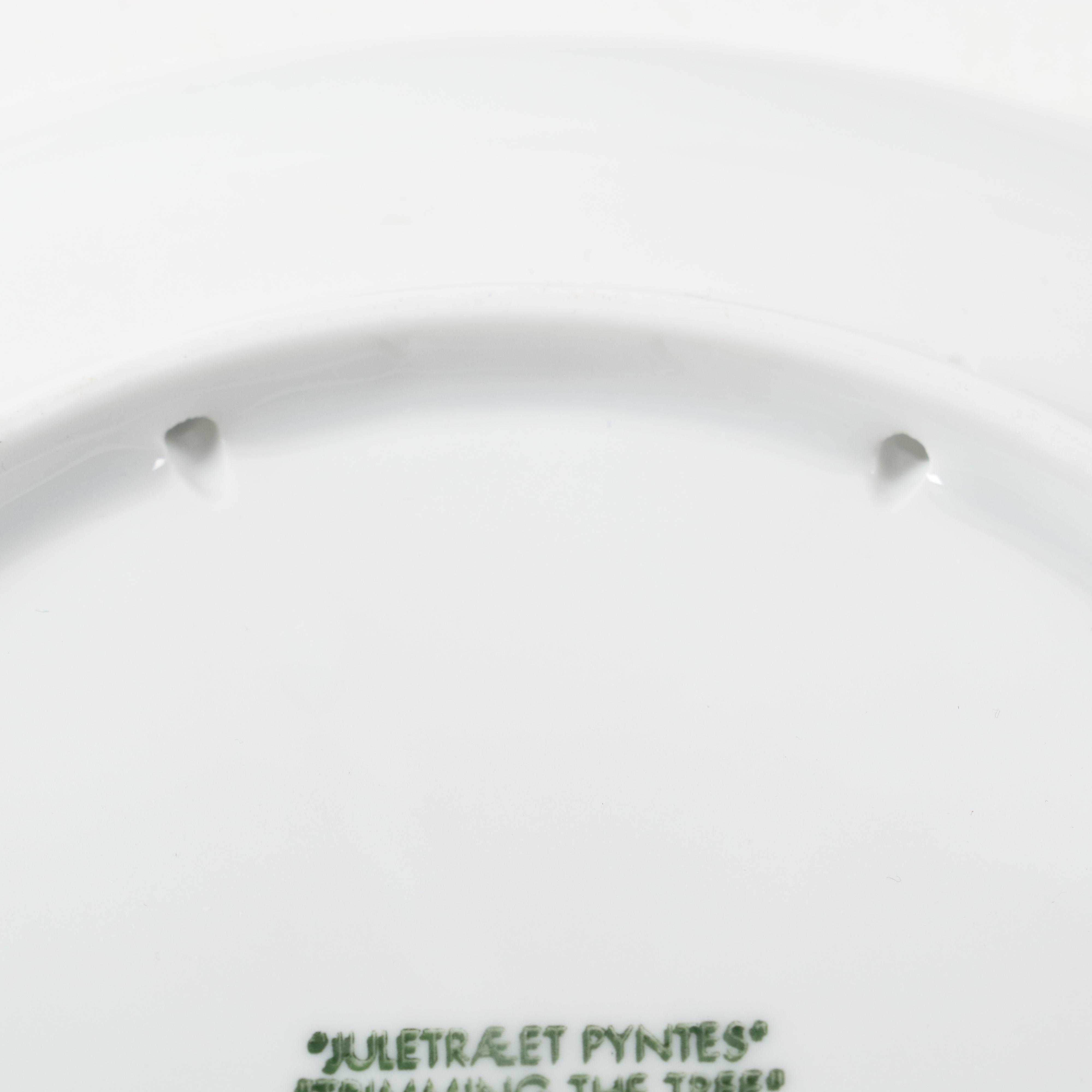 Royal Copenhagen "Trimming the Tree" and Other Porcelain Christmas Plates