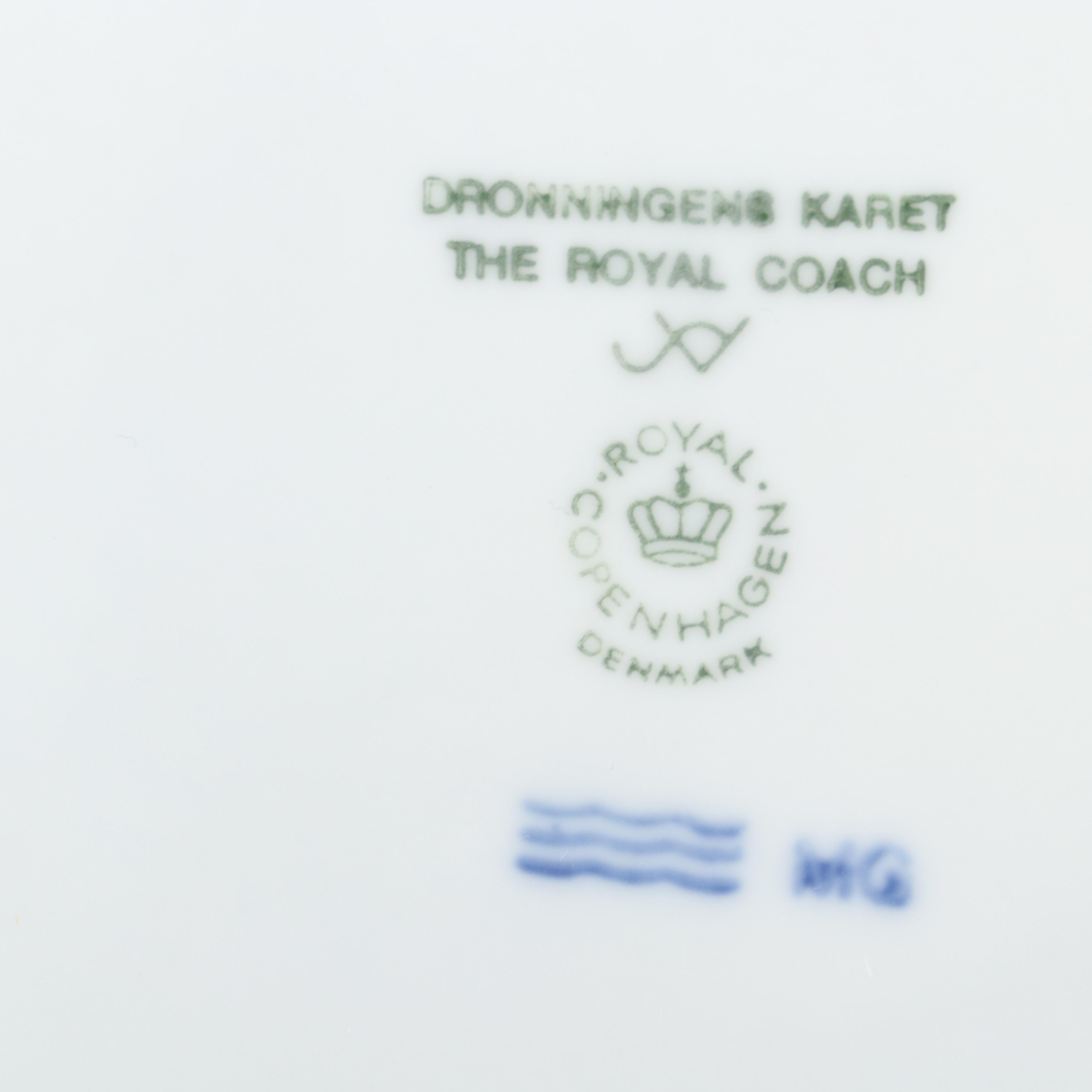 Royal Copenhagen "Trimming the Tree" and Other Porcelain Christmas Plates