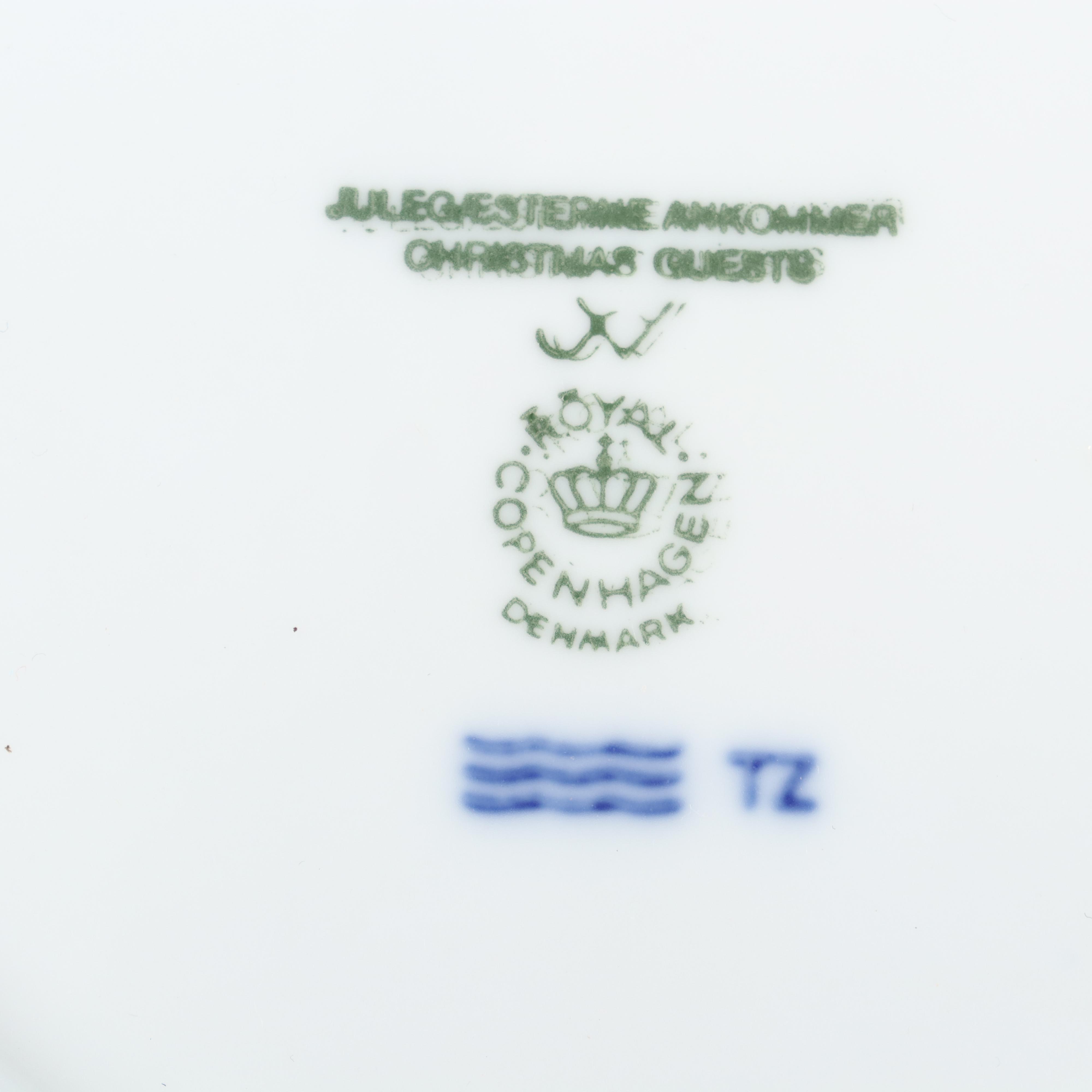 Royal Copenhagen "Trimming the Tree" and Other Porcelain Christmas Plates