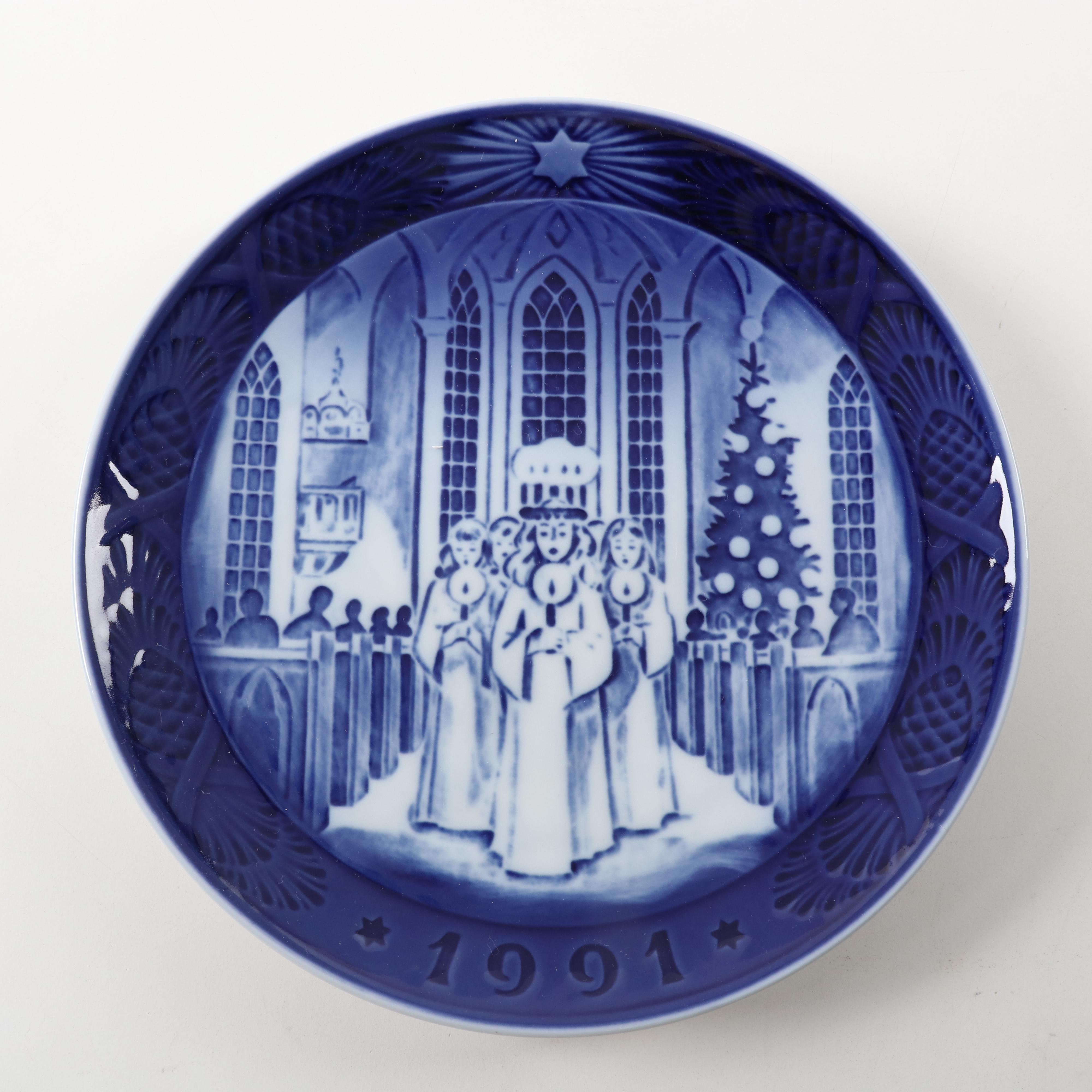 Royal Copenhagen "Trimming the Tree" and Other Porcelain Christmas Plates