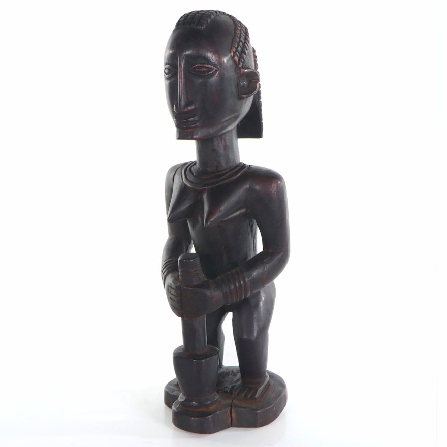 West African Carved Wood Female Figure with Mortar and Pestle