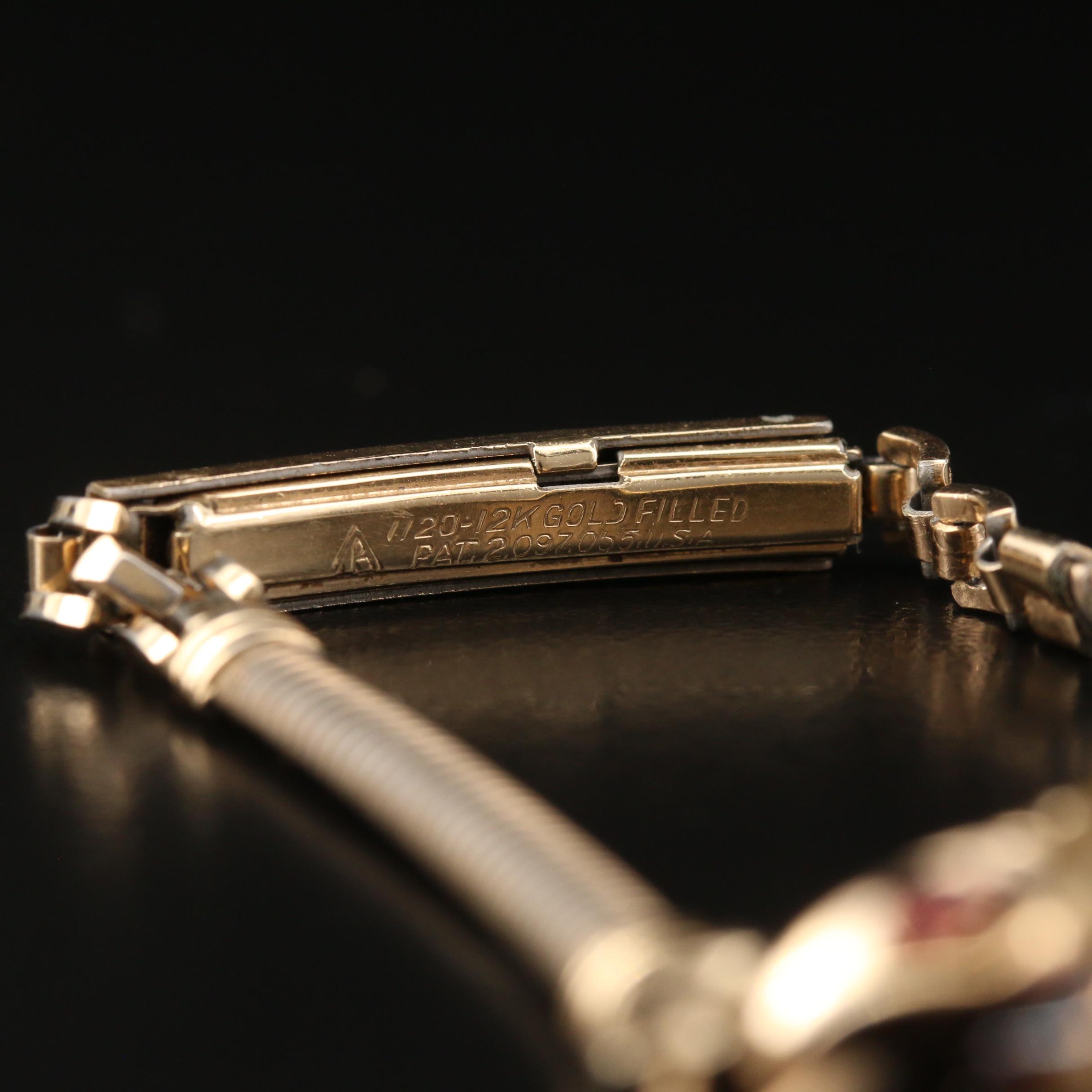 Vintage Banner Stem Wind Watch with Red and White Crystal Accents