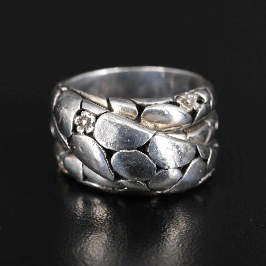 Sterling Silver Textured Crossover Ring with Flower Accents