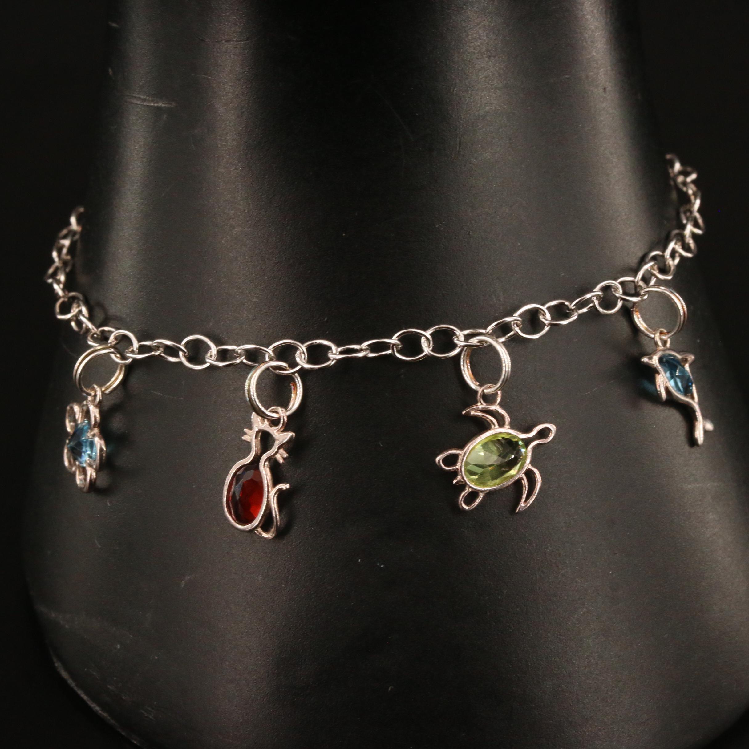 Sterling Silver Topaz, Peridot and Garnet Charm Bracelet