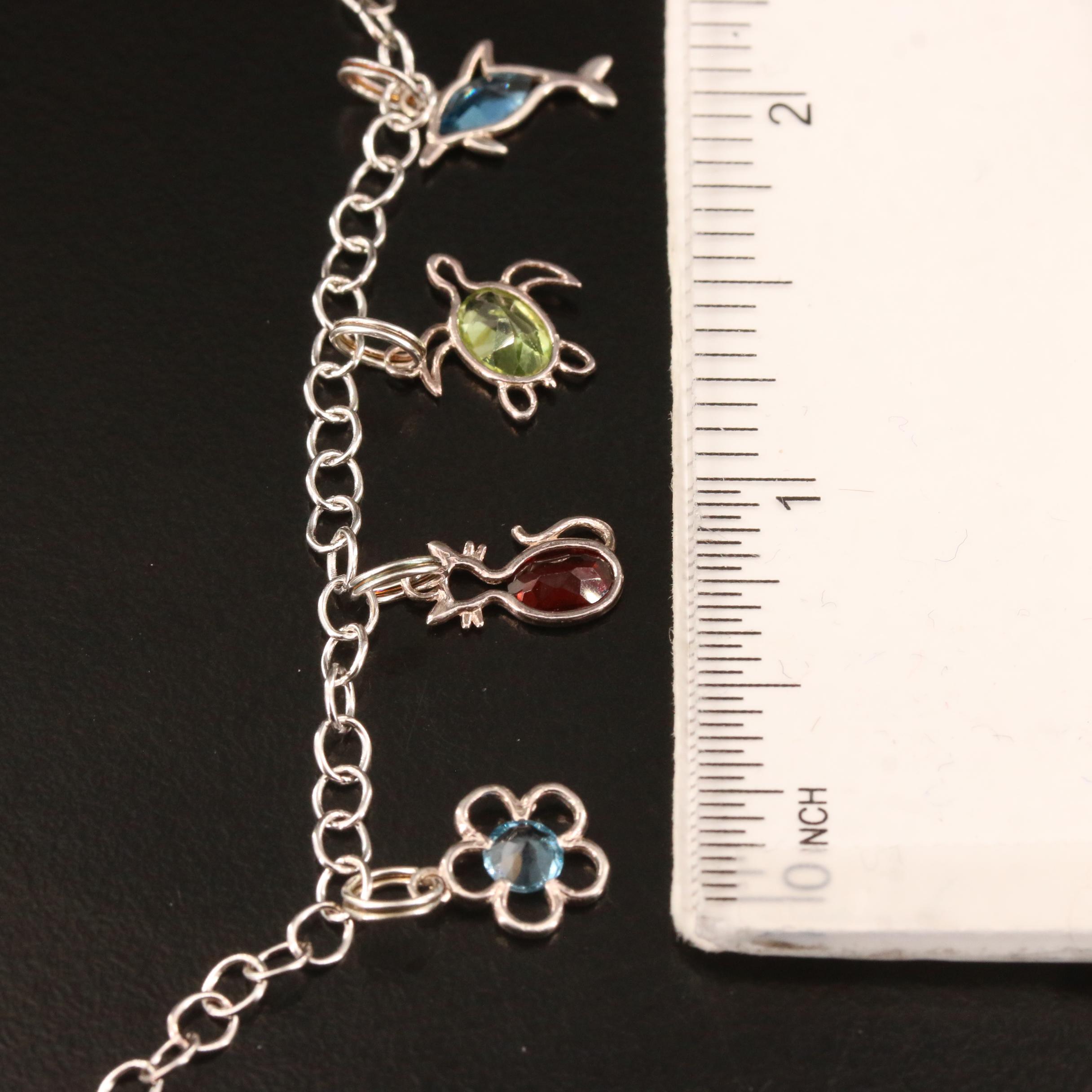 Sterling Silver Topaz, Peridot and Garnet Charm Bracelet