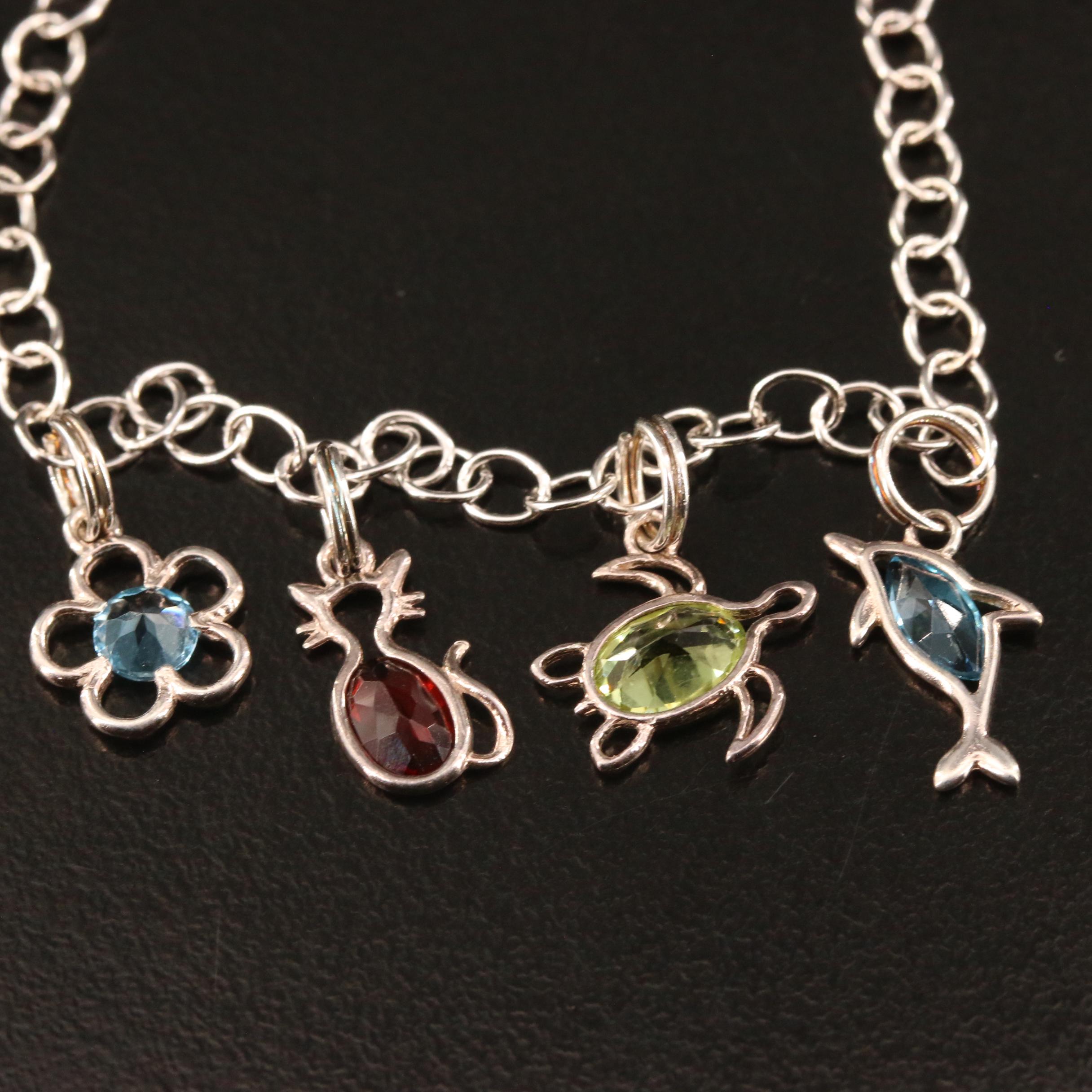 Sterling Silver Topaz, Peridot and Garnet Charm Bracelet