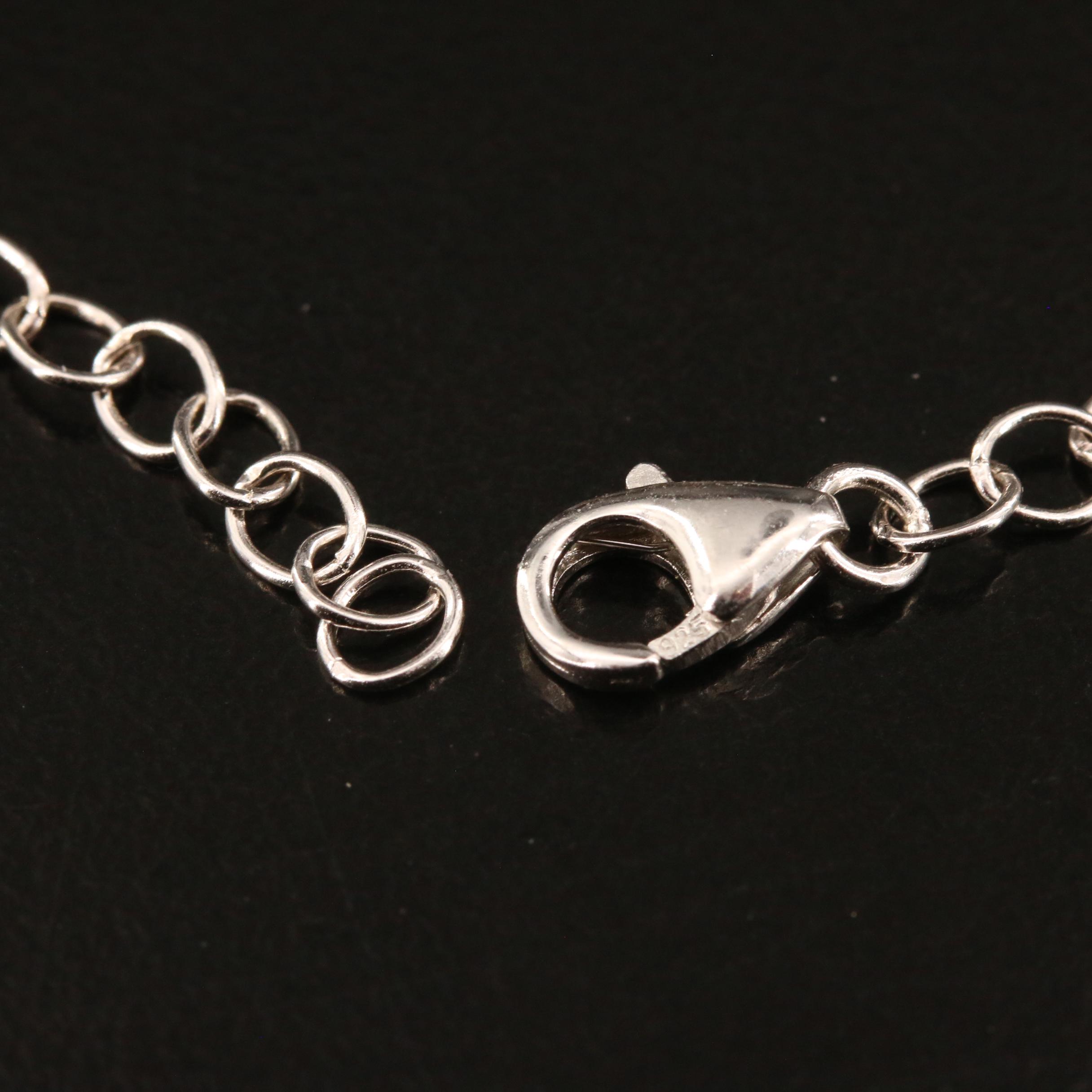 Sterling Silver Topaz, Peridot and Garnet Charm Bracelet