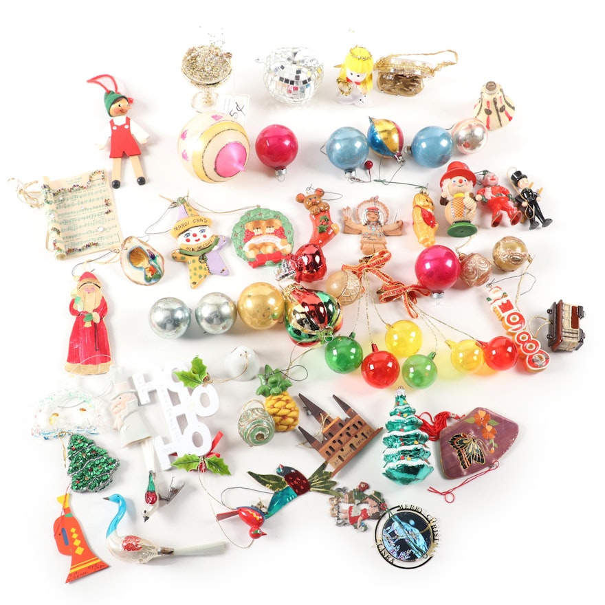 Glass Christmas Ornaments Including Bear, Angel, Pinnochio, and More