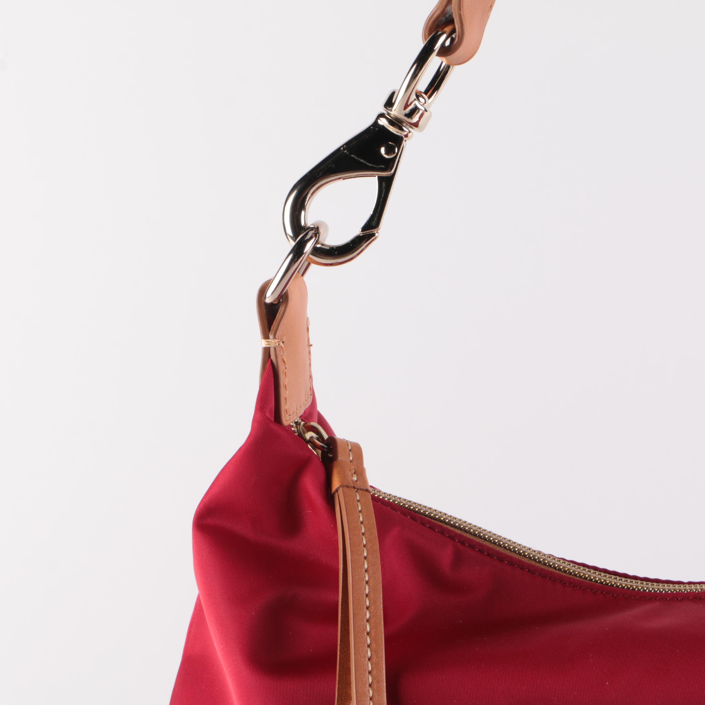 Dooney & Bourke Juliette Tassel Hobo Bag in Red Nylon with Tan Leather Trim