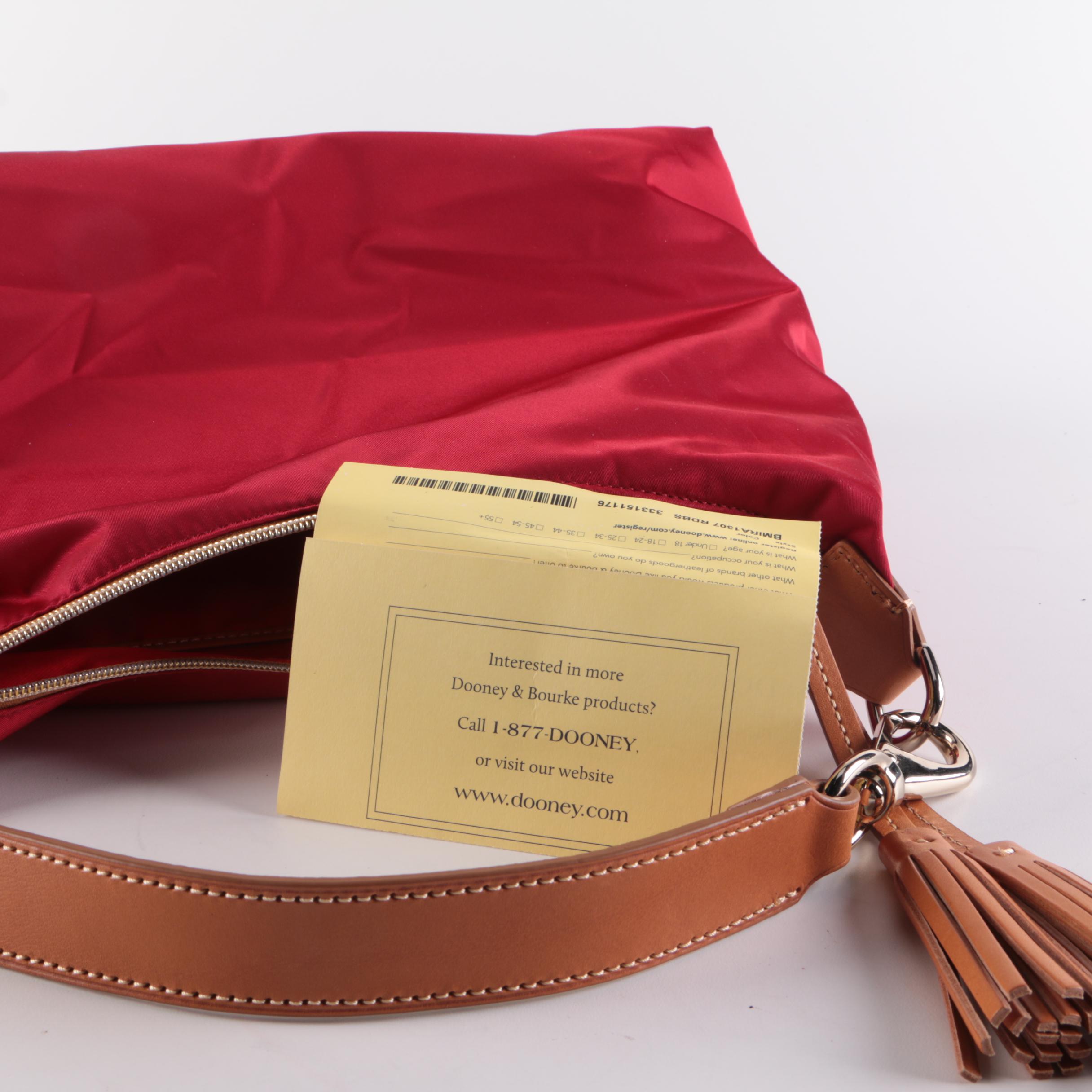 Dooney & Bourke Juliette Tassel Hobo Bag in Red Nylon with Tan Leather Trim
