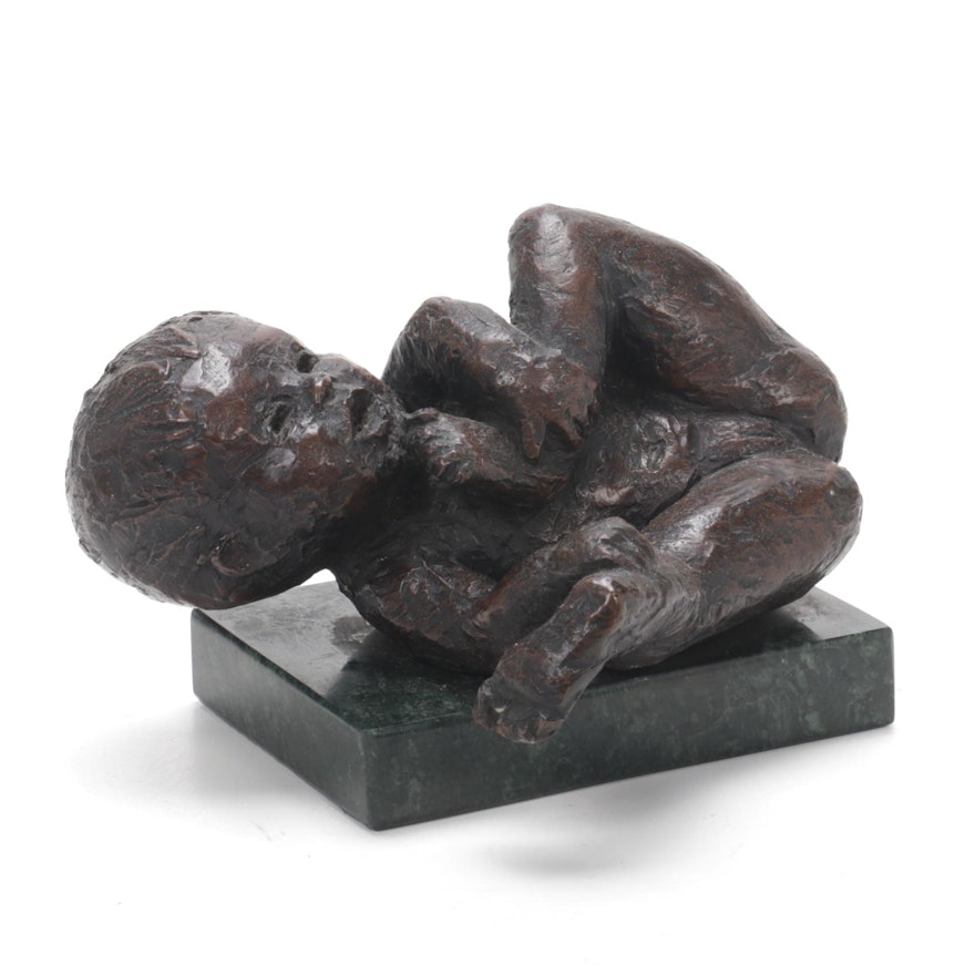 Bronzed Plaster Baby Figure on Green Marble Base