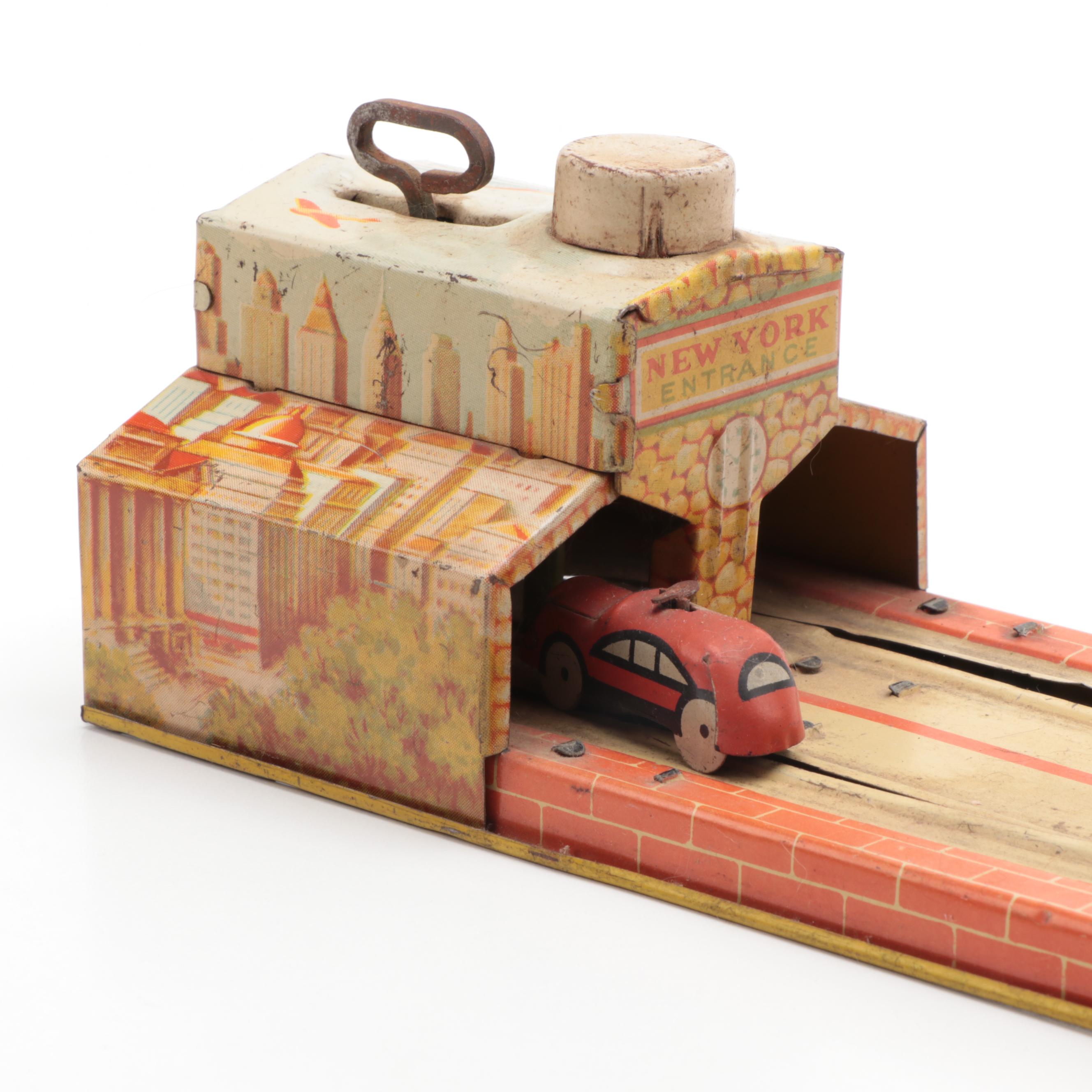 Unique Art Mfg. Co. "Lincoln Tunnel" Tin Lithograph Wind-Up Toy, 1930s