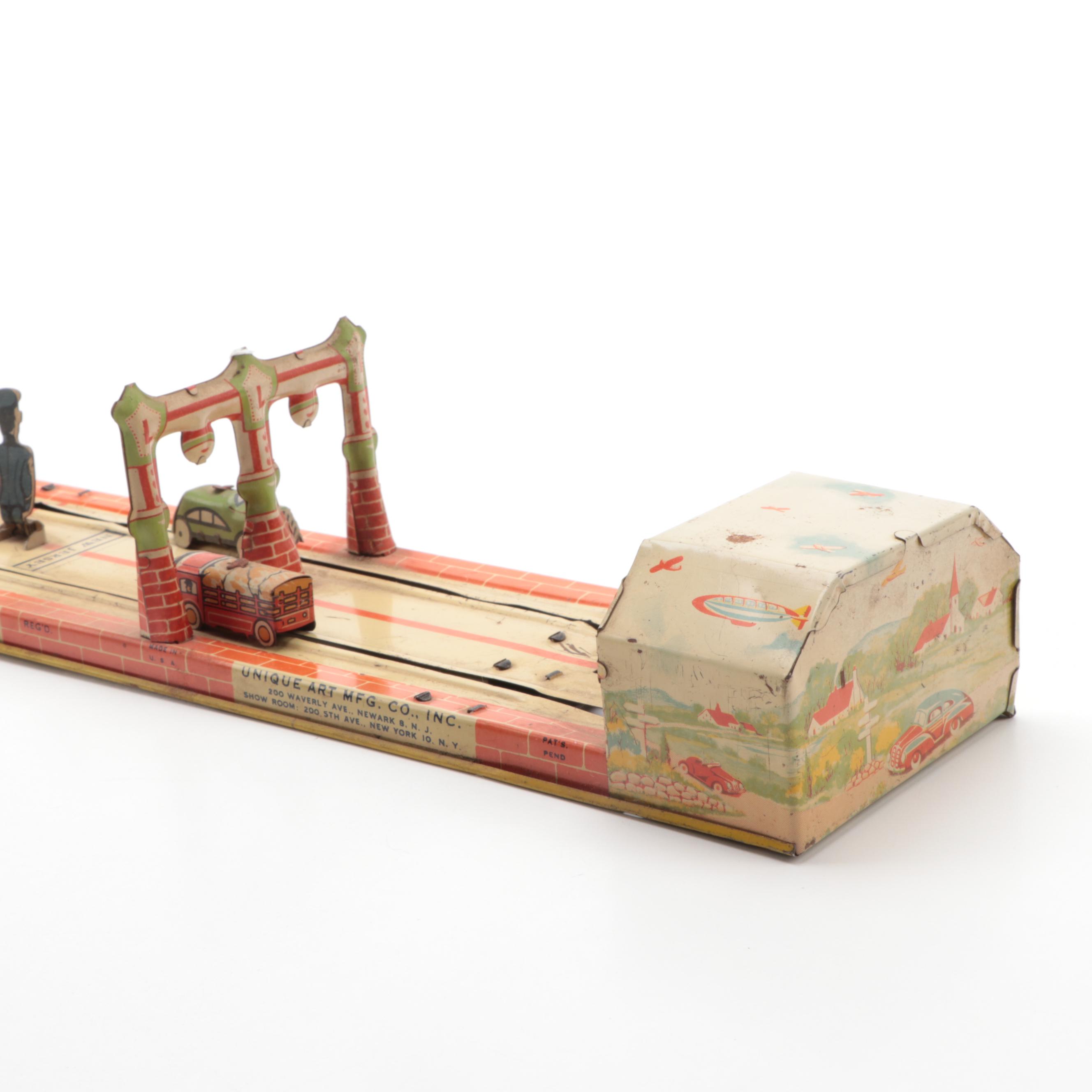 Unique Art Mfg. Co. "Lincoln Tunnel" Tin Lithograph Wind-Up Toy, 1930s