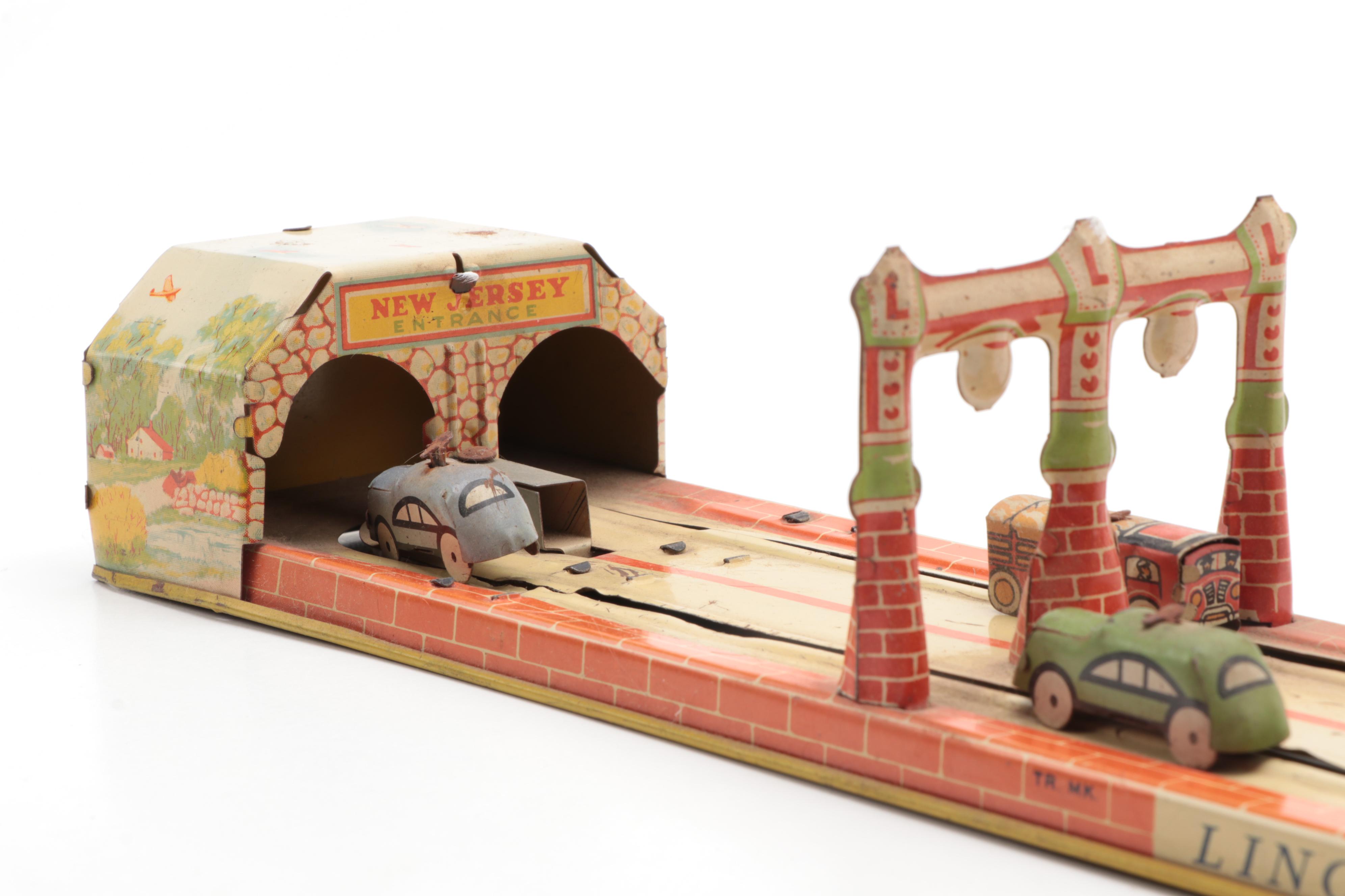Unique Art Mfg. Co. "Lincoln Tunnel" Tin Lithograph Wind-Up Toy, 1930s