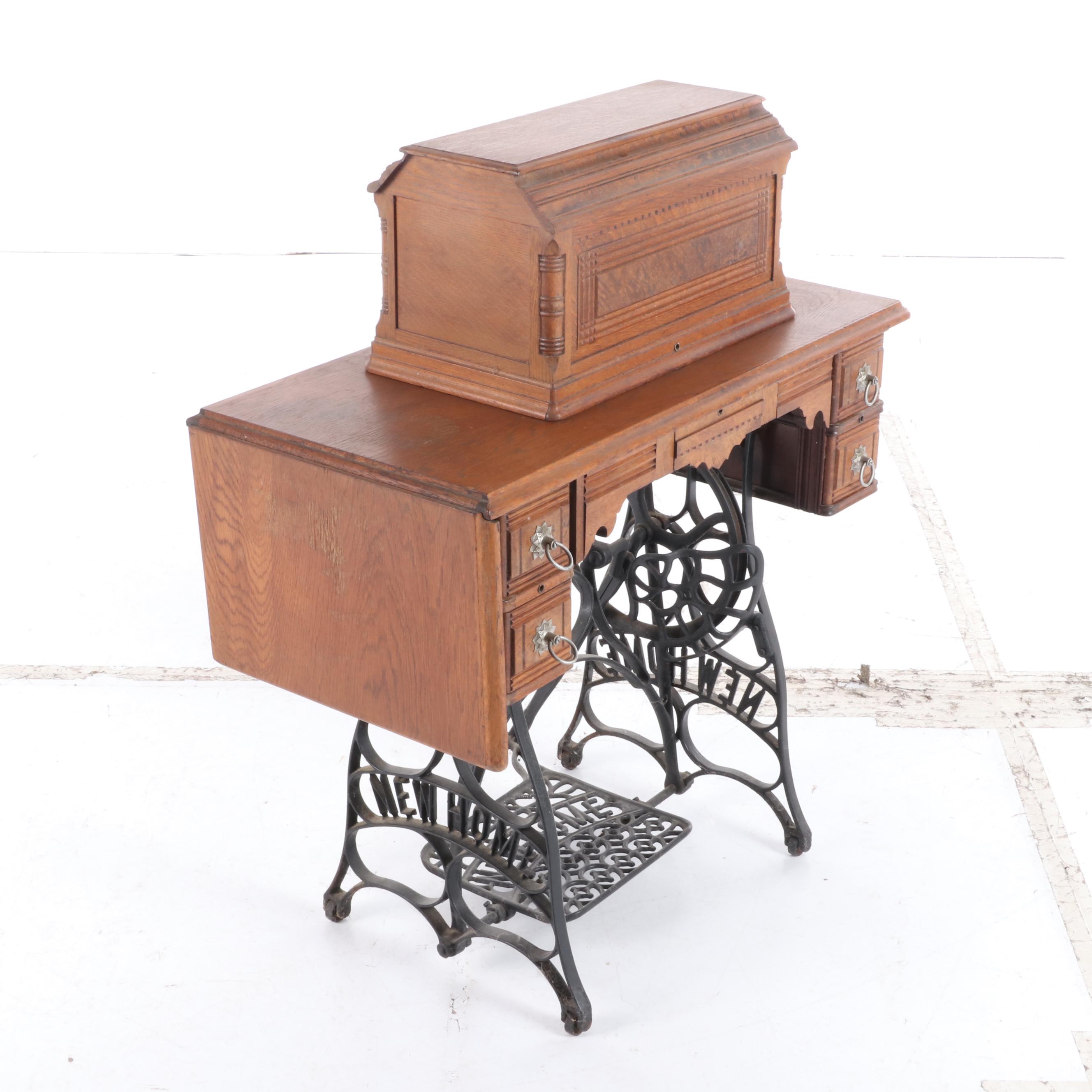 New Home Treadle Sewing Machine and Oak Sewing Table, circa 1890