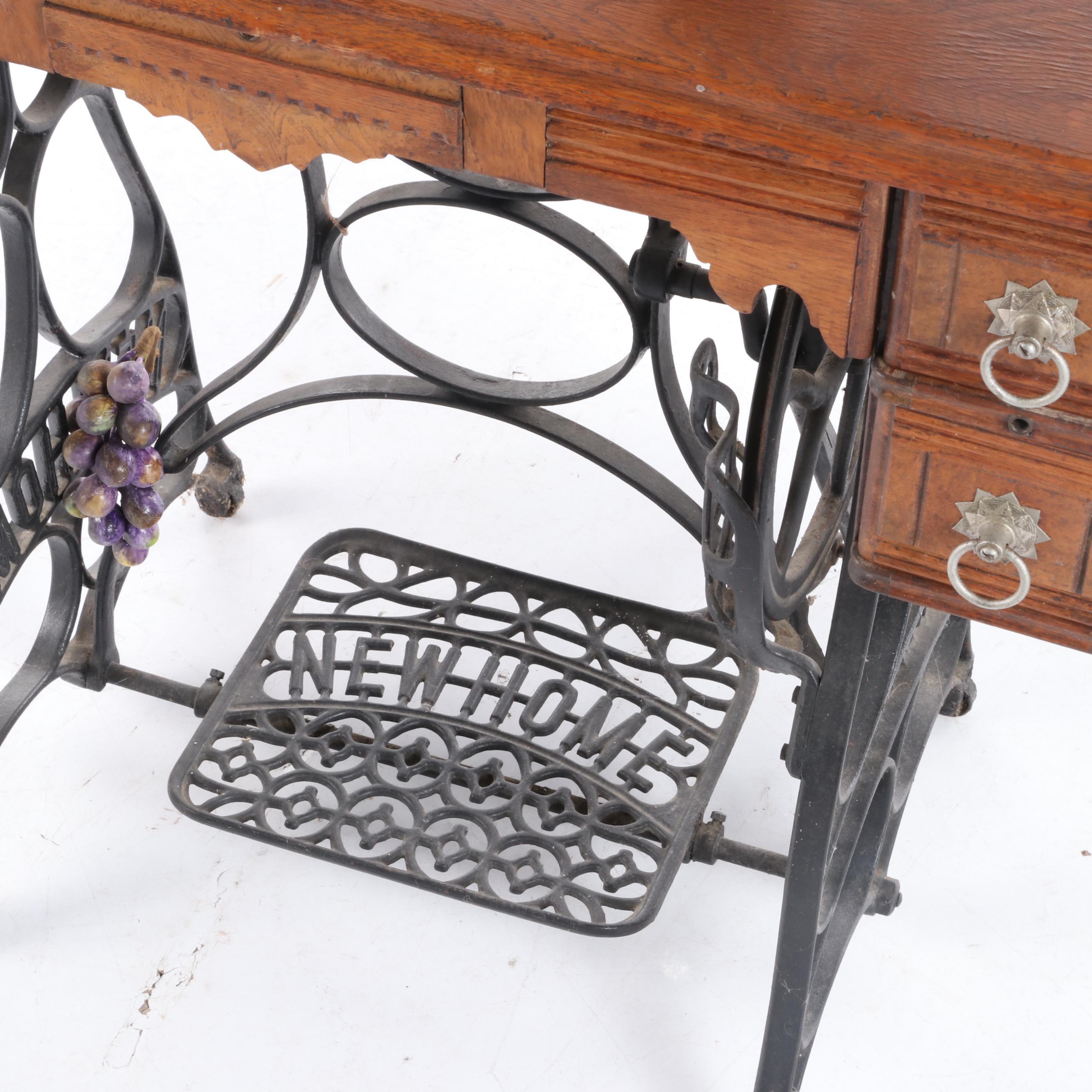 New Home Treadle Sewing Machine and Oak Sewing Table, circa 1890
