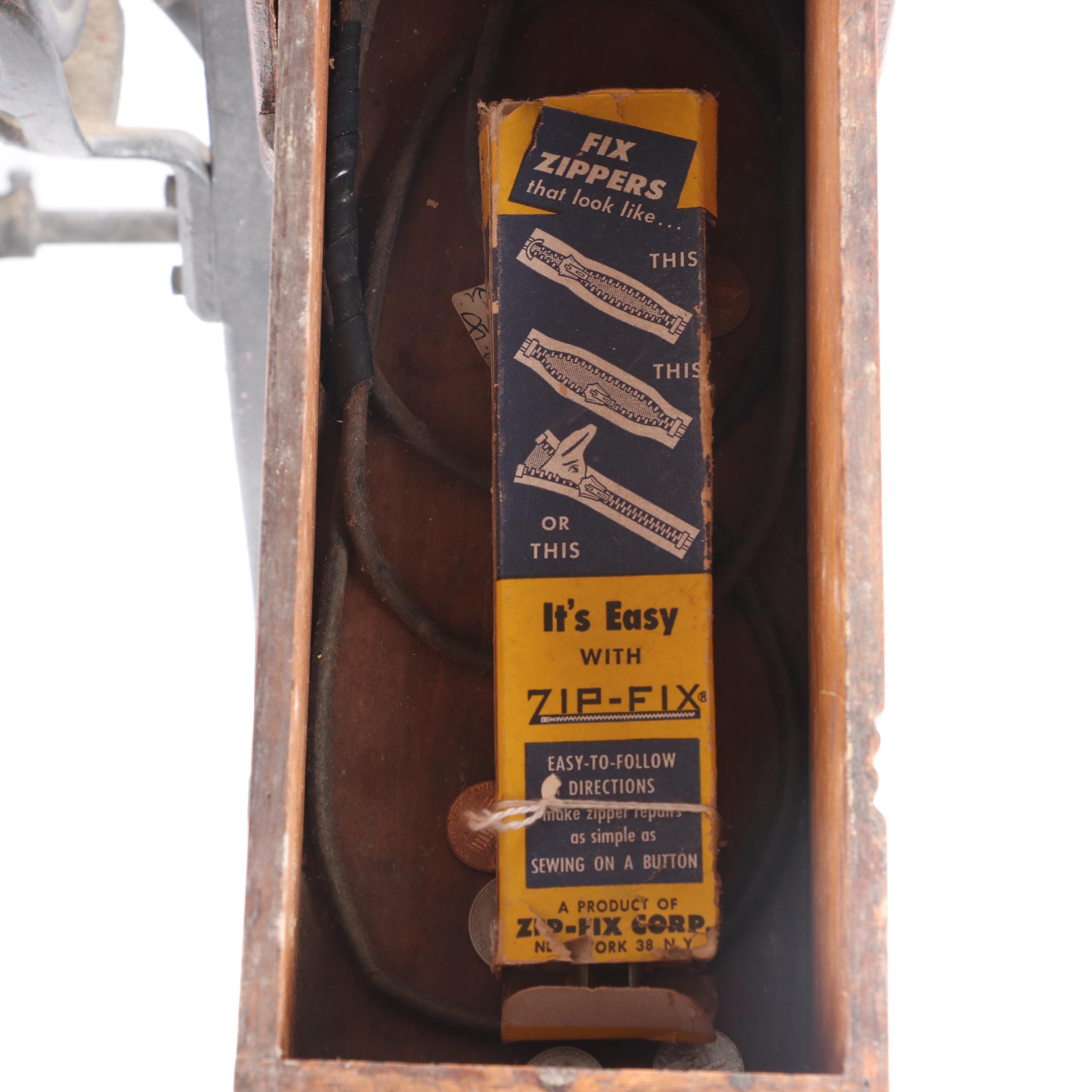 New Home Treadle Sewing Machine and Oak Sewing Table, circa 1890