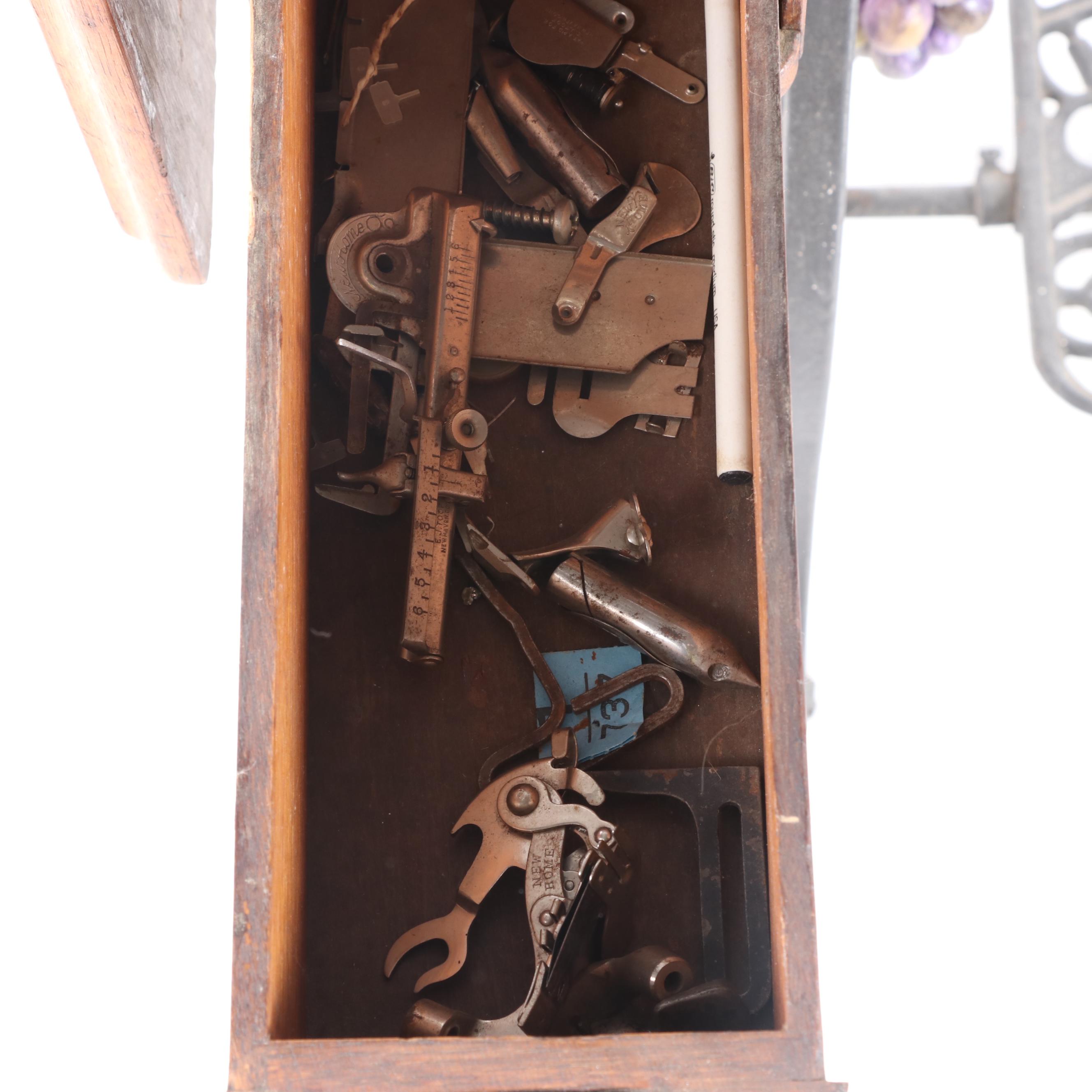 New Home Treadle Sewing Machine and Oak Sewing Table, circa 1890