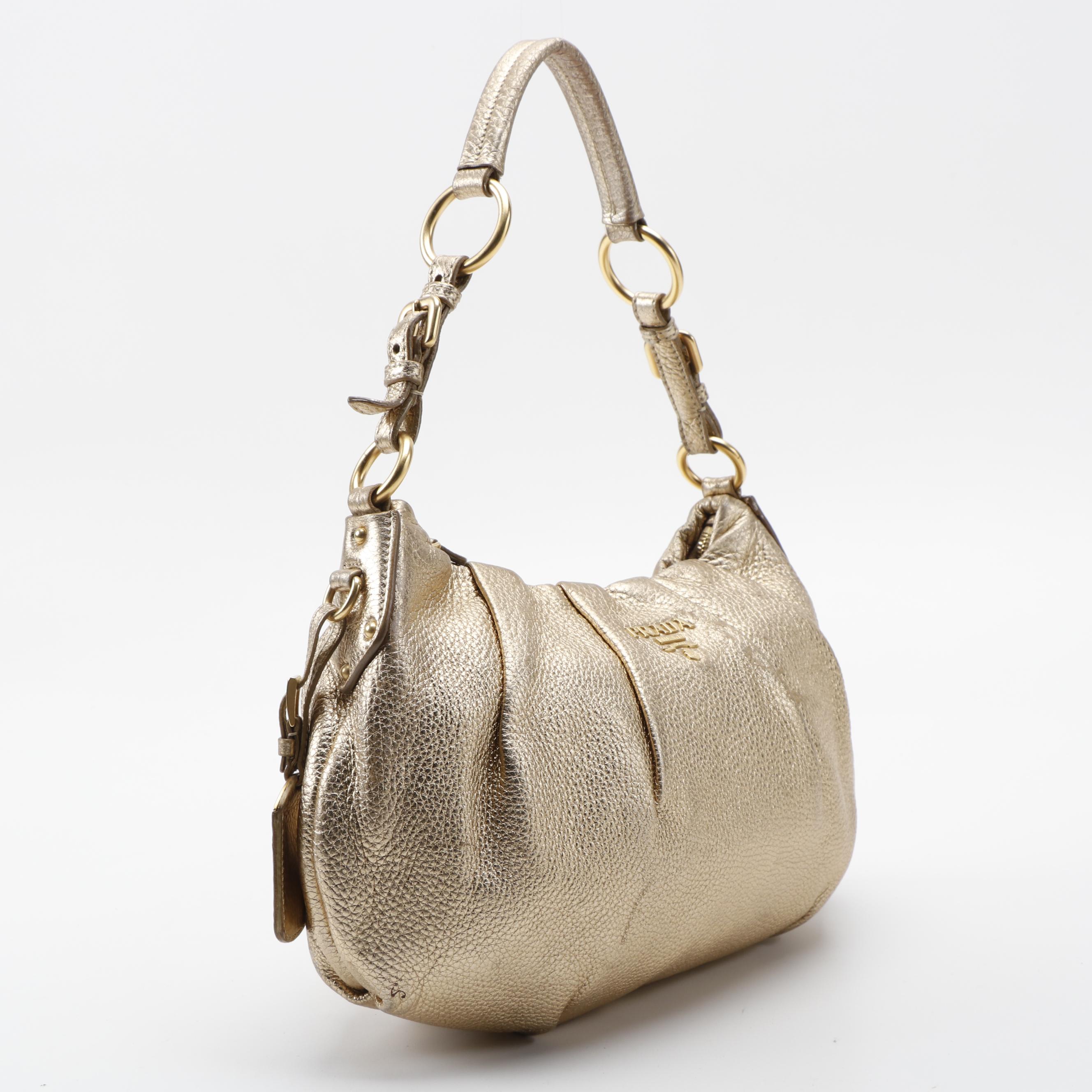 Prada Vitello Daino Hobo Bag in Gold Metallic Leather