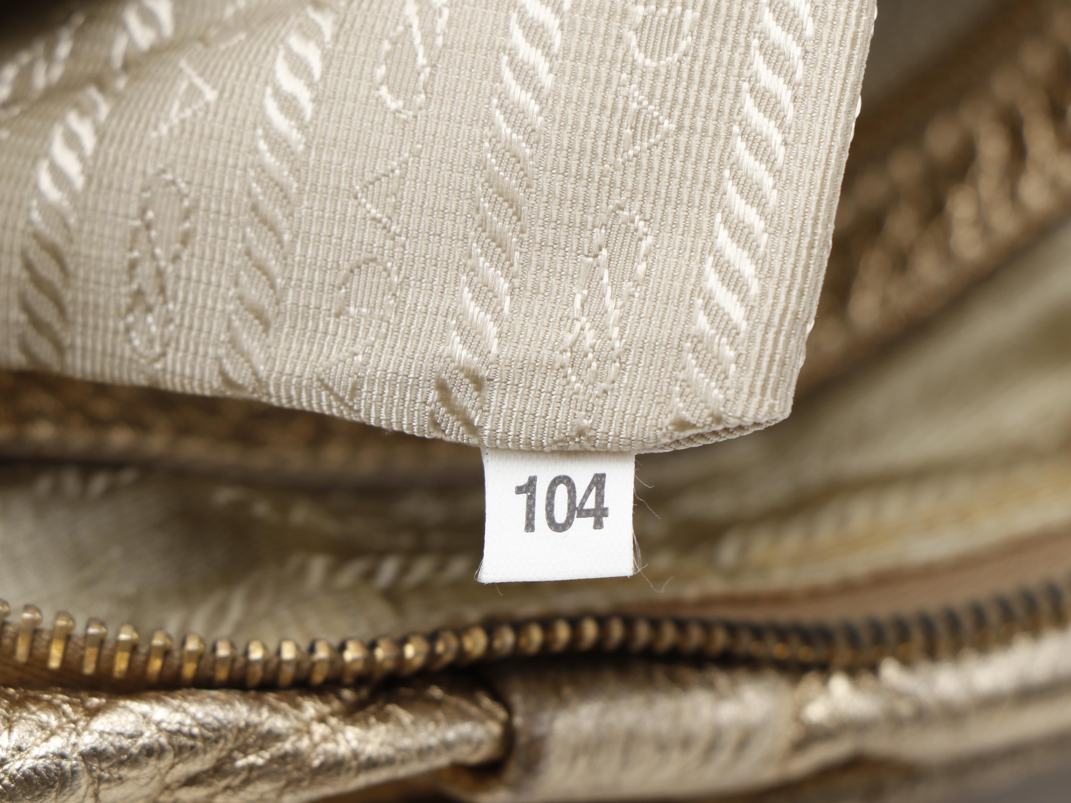 Prada Vitello Daino Hobo Bag in Gold Metallic Leather