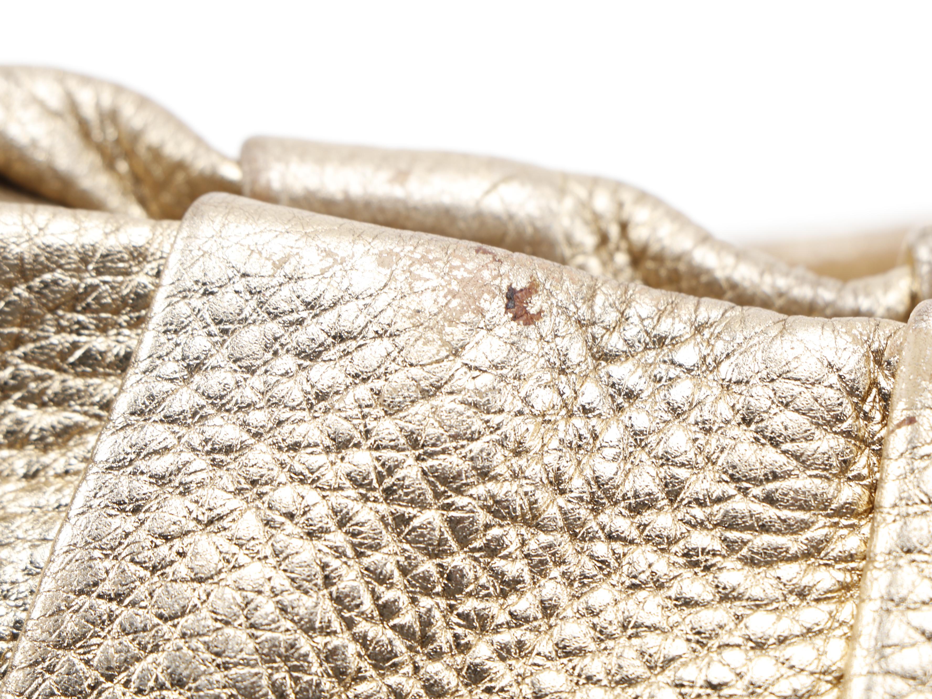 Prada Vitello Daino Hobo Bag in Gold Metallic Leather