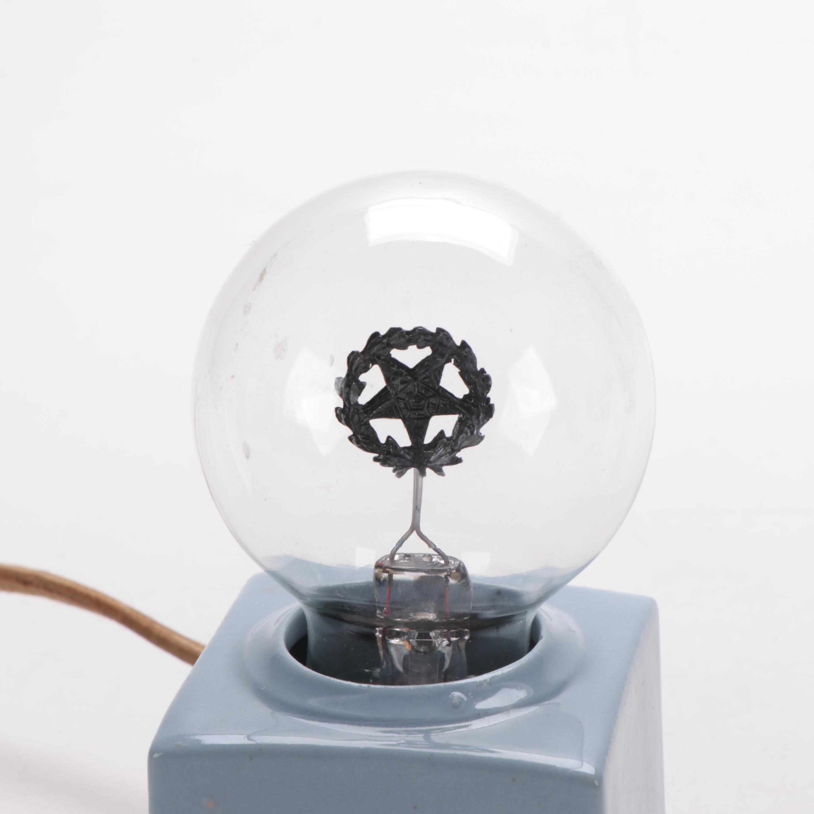 "Eastern Star" Art Deco Aerolux Neon Light Bulb with Ceramic Stand, circa 1938