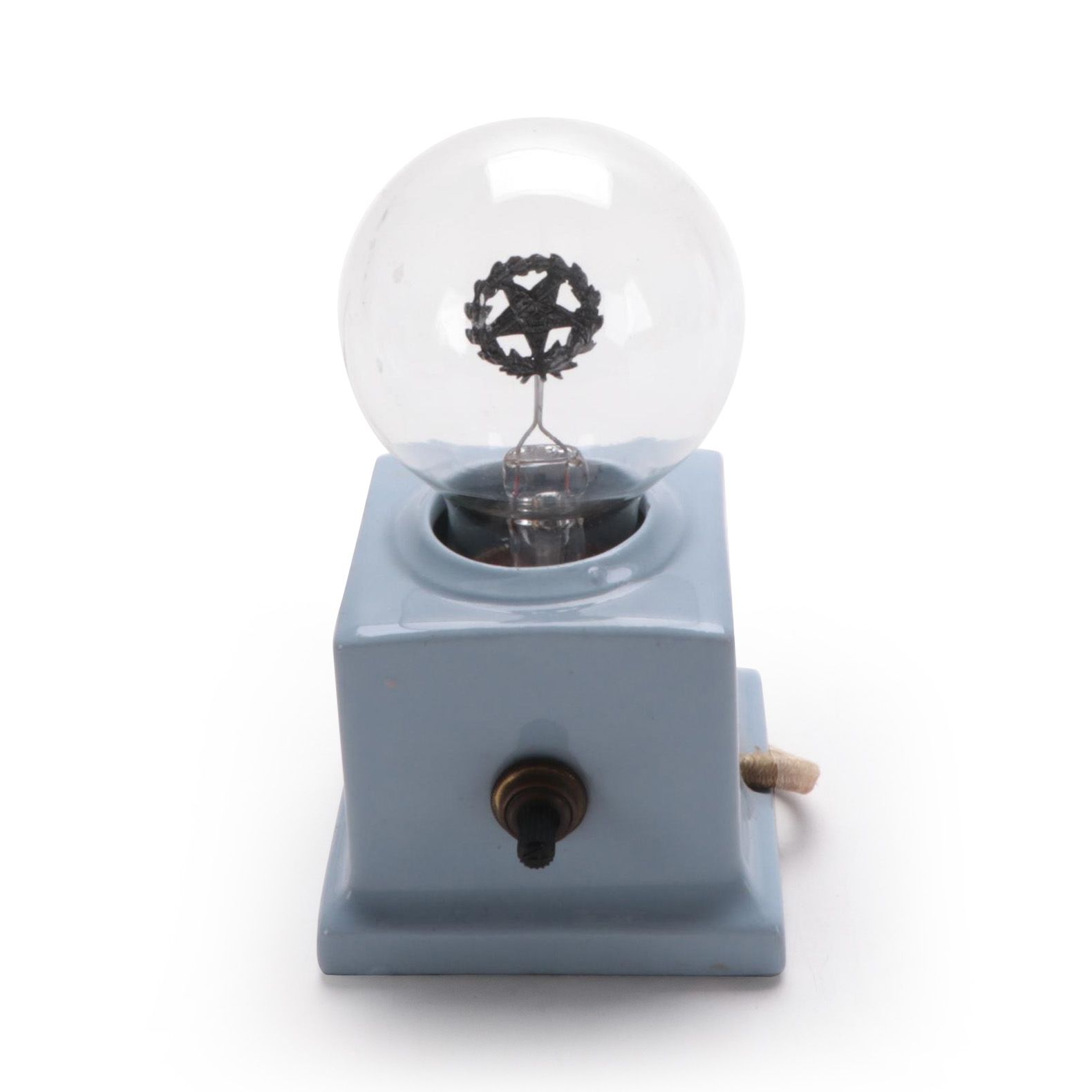 "Eastern Star" Art Deco Aerolux Neon Light Bulb with Ceramic Stand, circa 1938