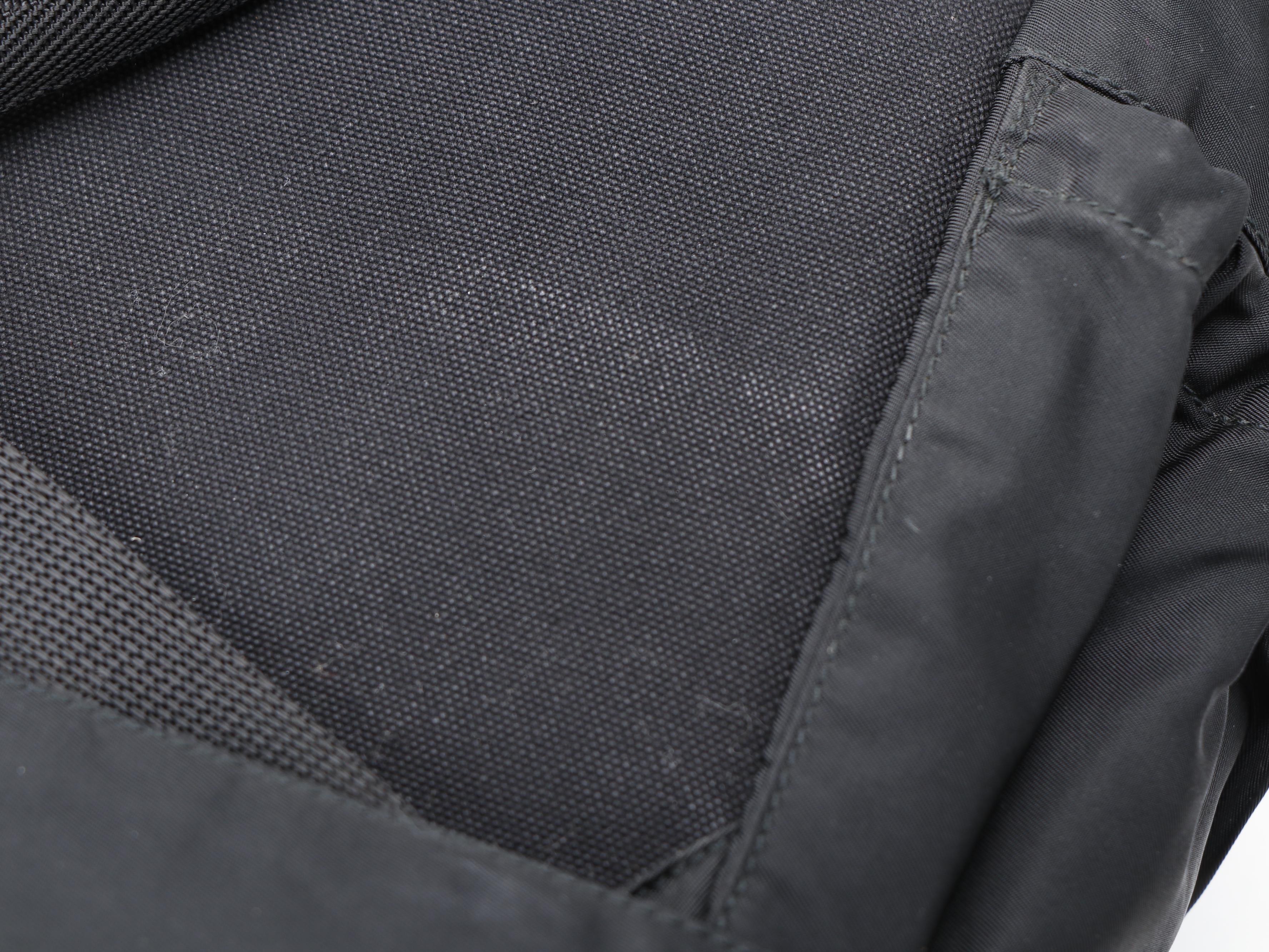 Prada Double Buckle Black Nylon and Canvas Backpack with Belt Straps