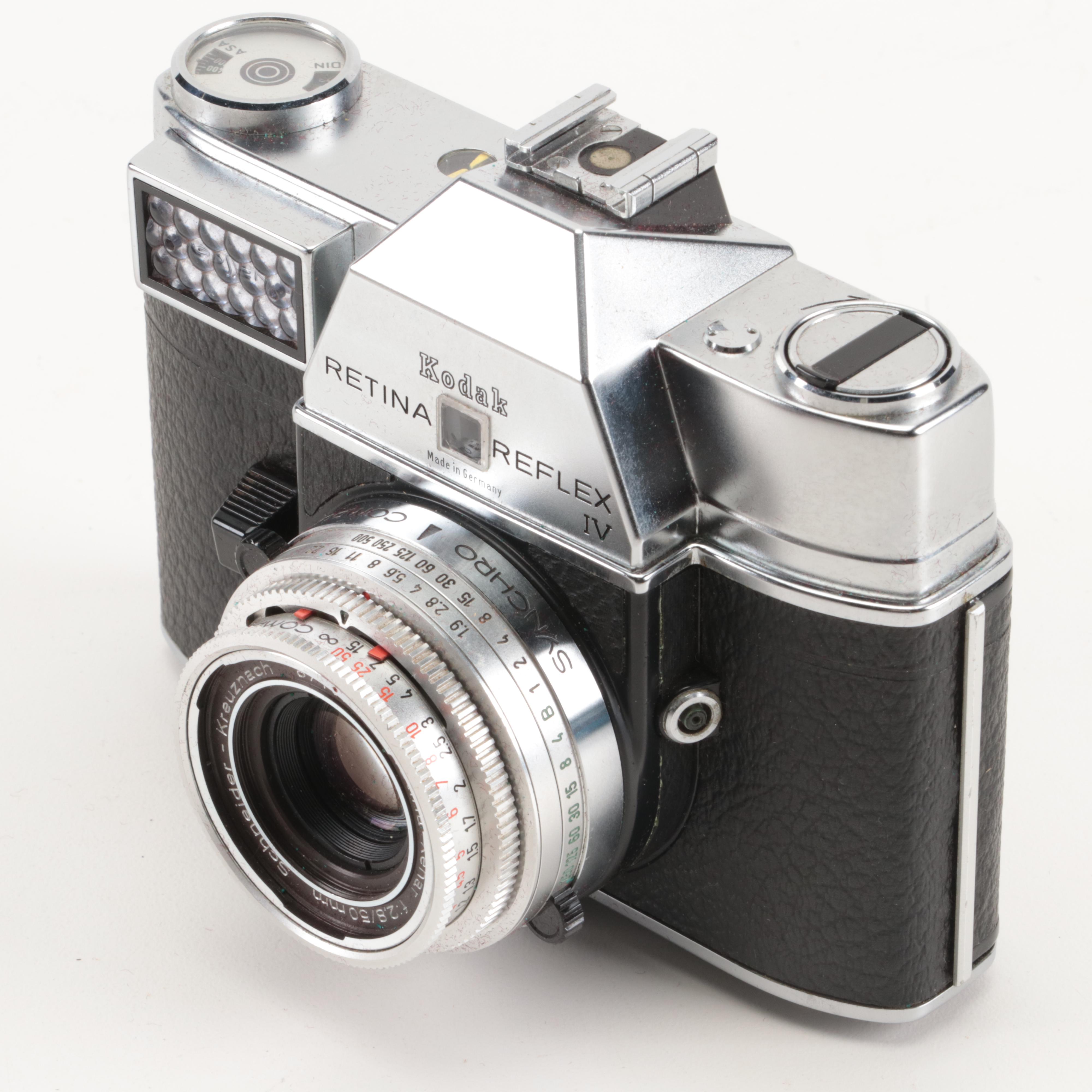 Collection of Kodak Retina Reflex Cameras With Leather Cases