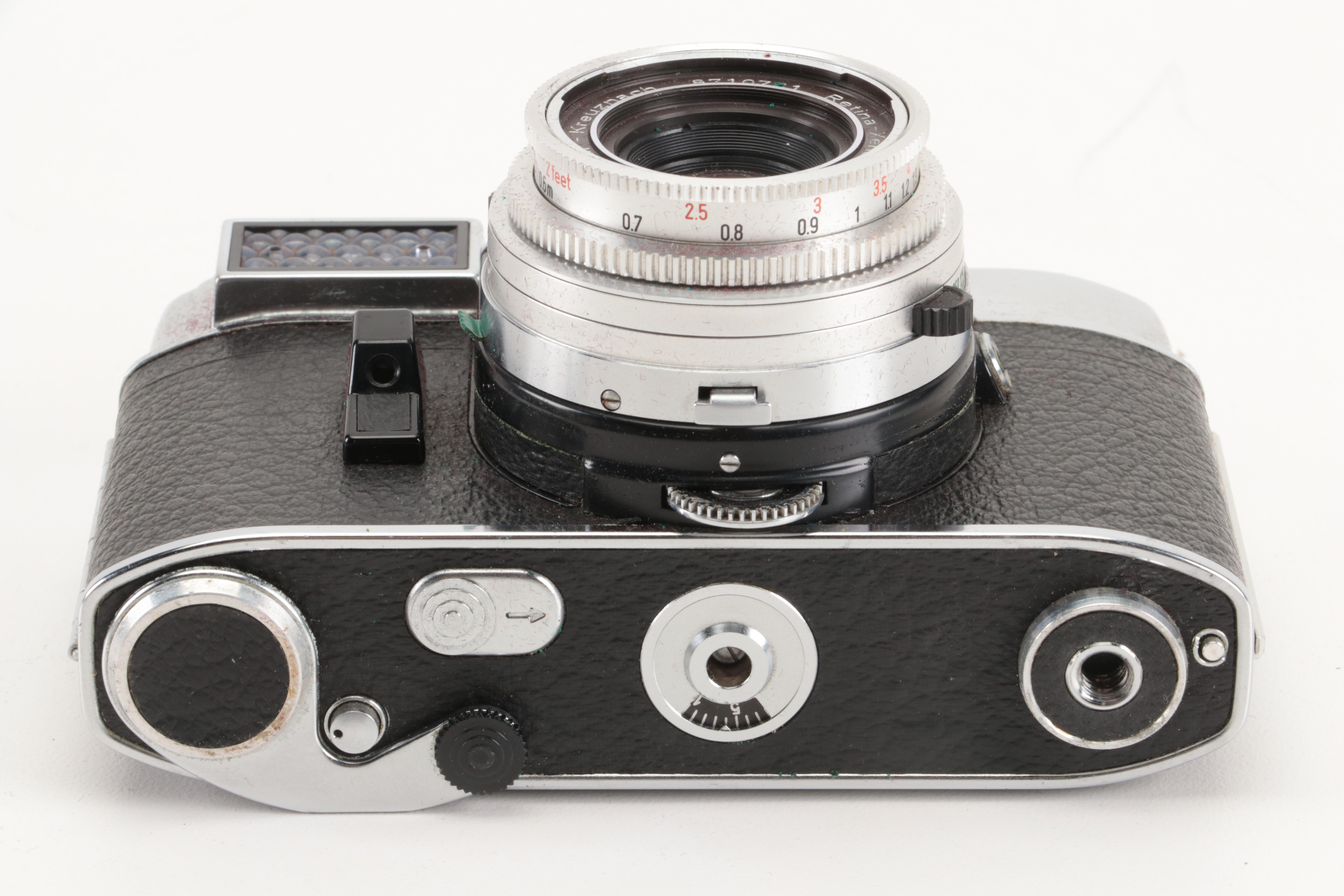 Collection of Kodak Retina Reflex Cameras With Leather Cases