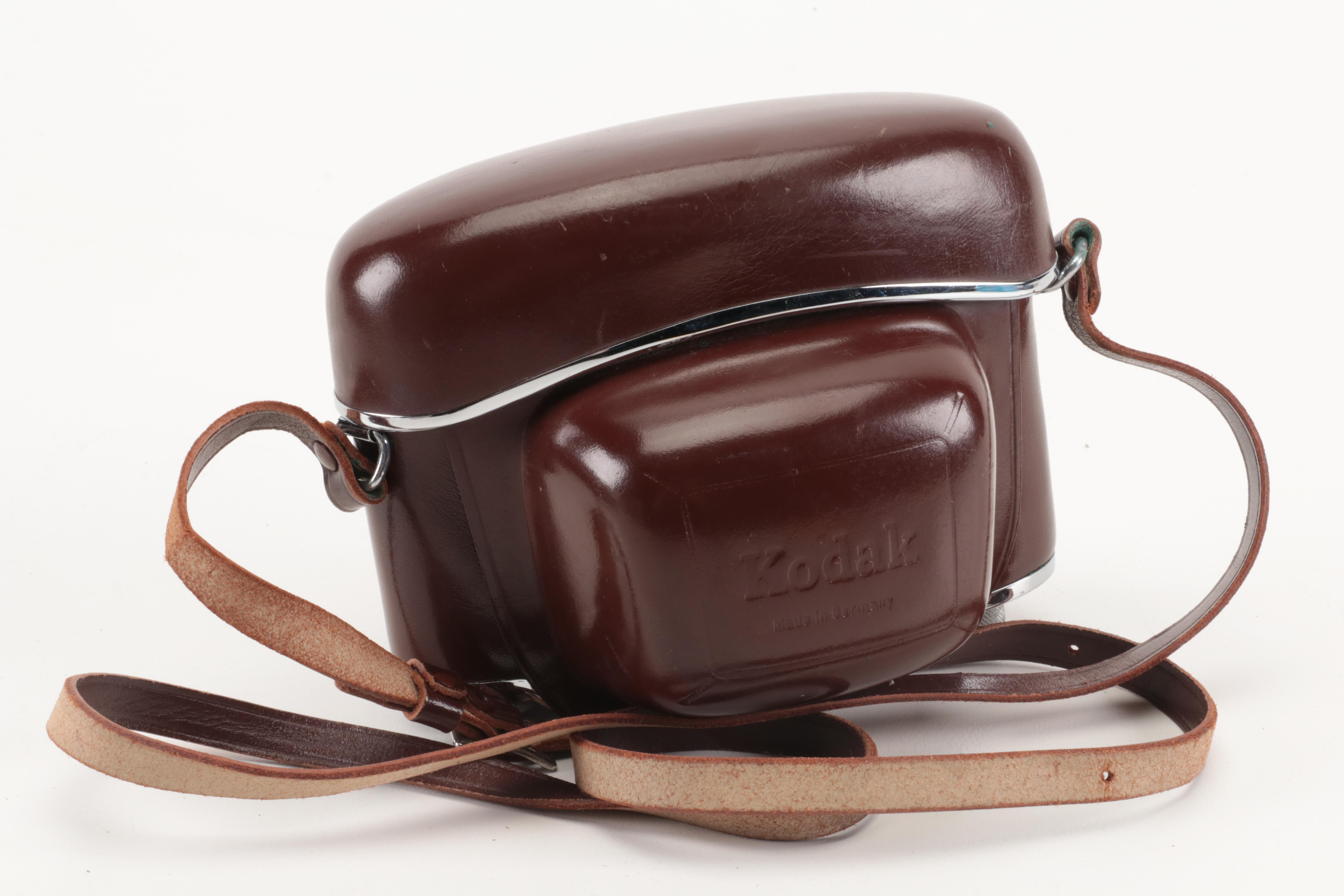 Collection of Kodak Retina Reflex Cameras With Leather Cases