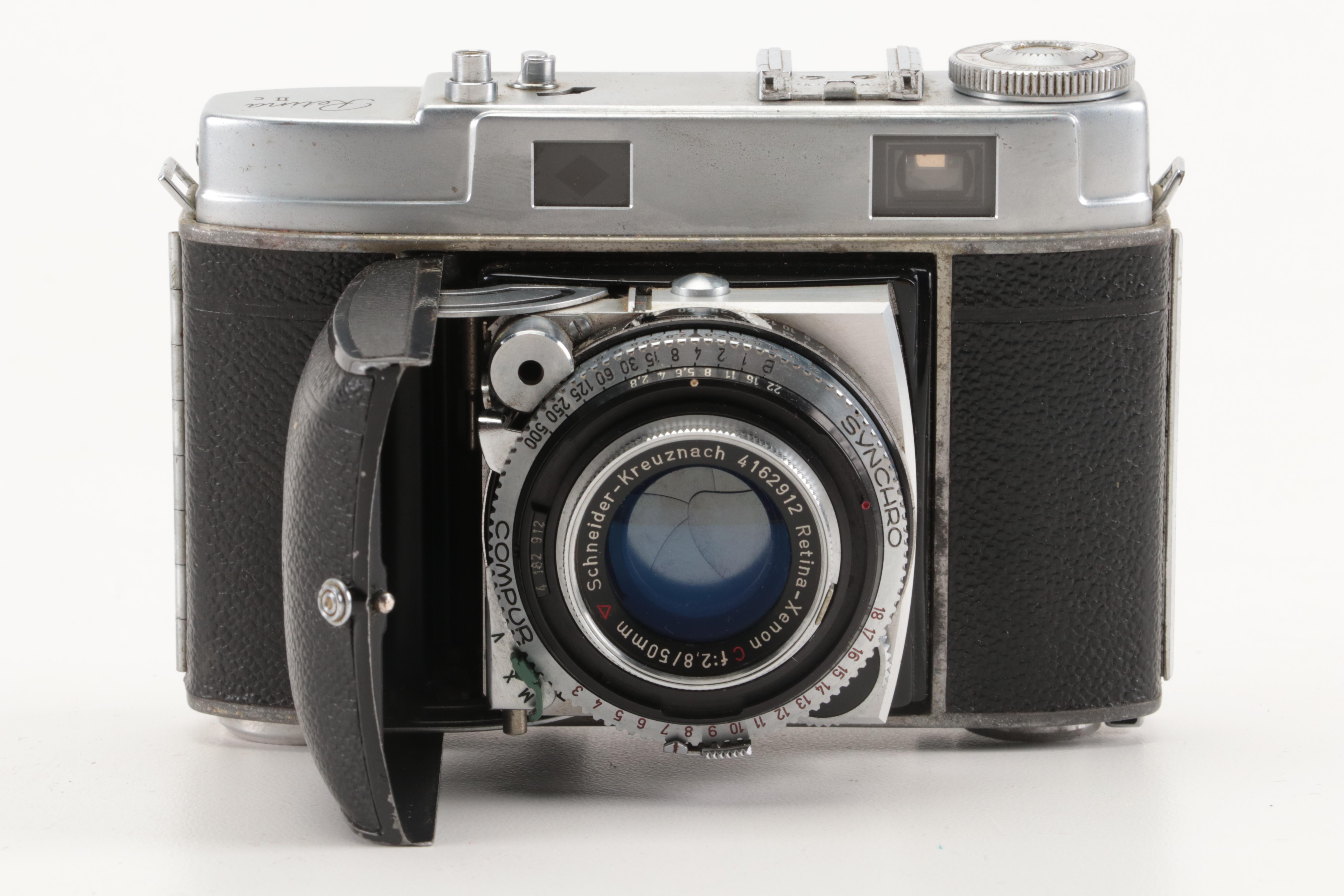 Collection of Kodak Retina Reflex Cameras With Leather Cases