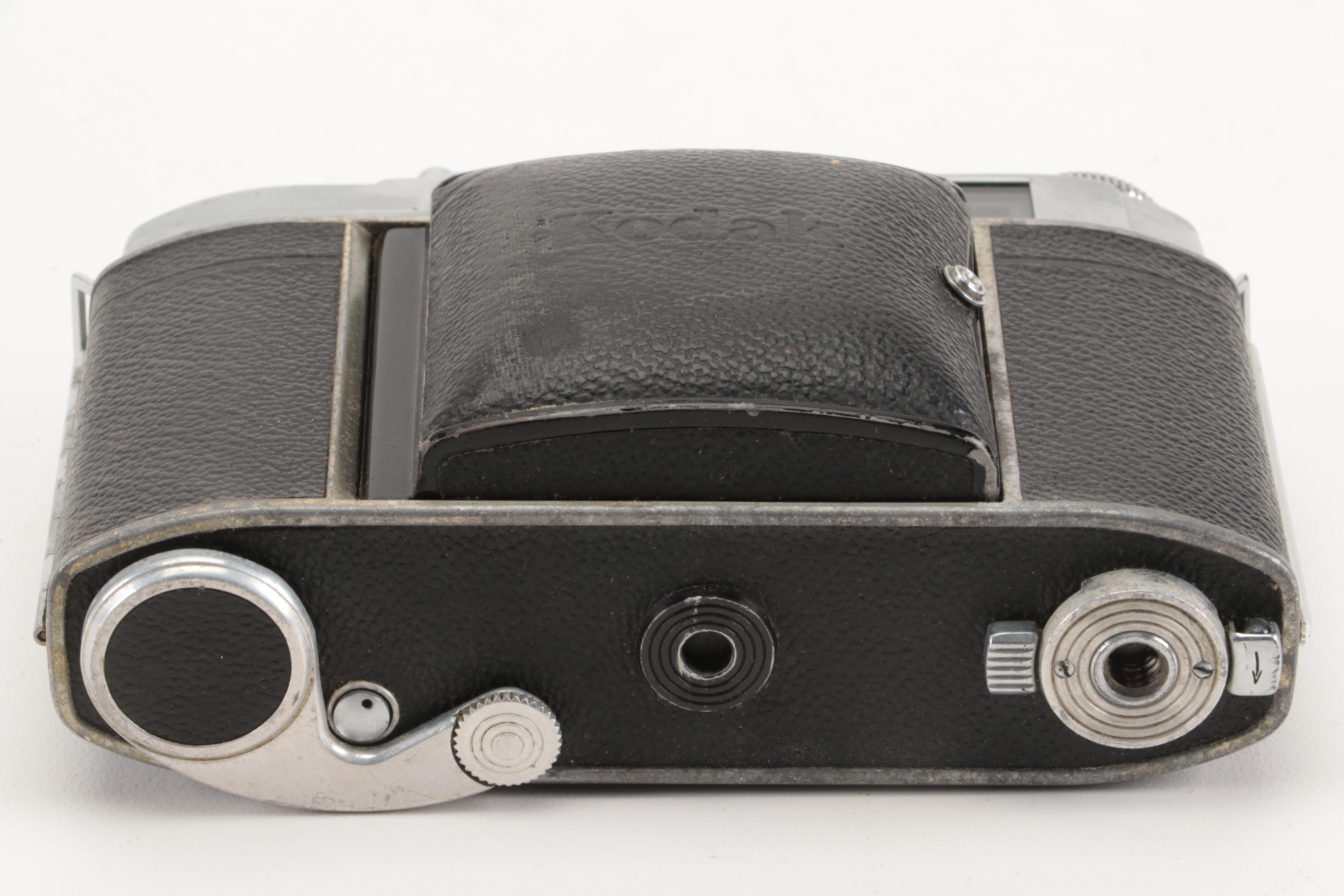 Collection of Kodak Retina Reflex Cameras With Leather Cases